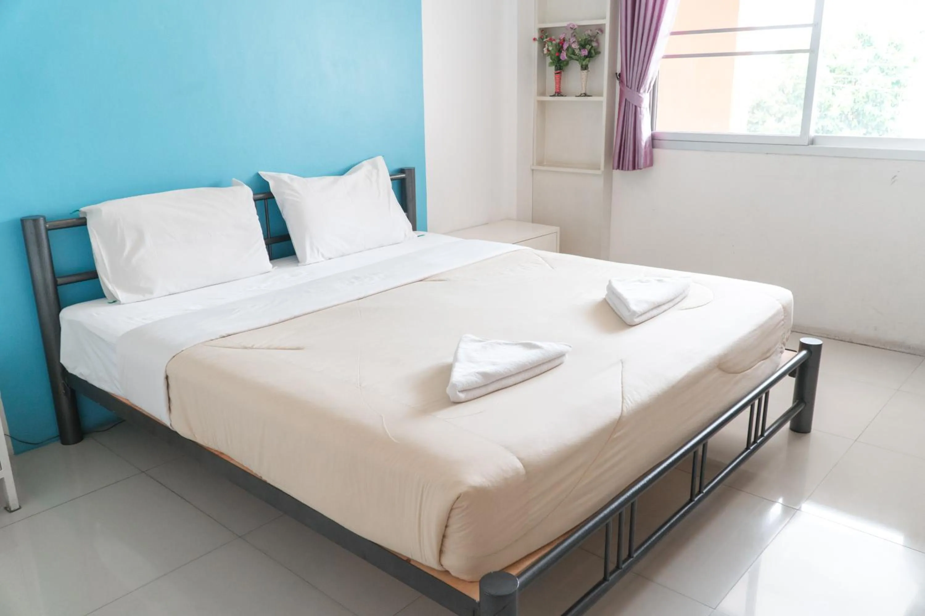 Bed in Noble House Chiangmai