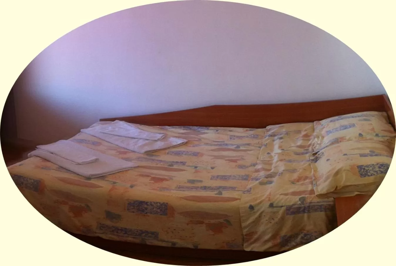 Bed in Hotel Poseidon