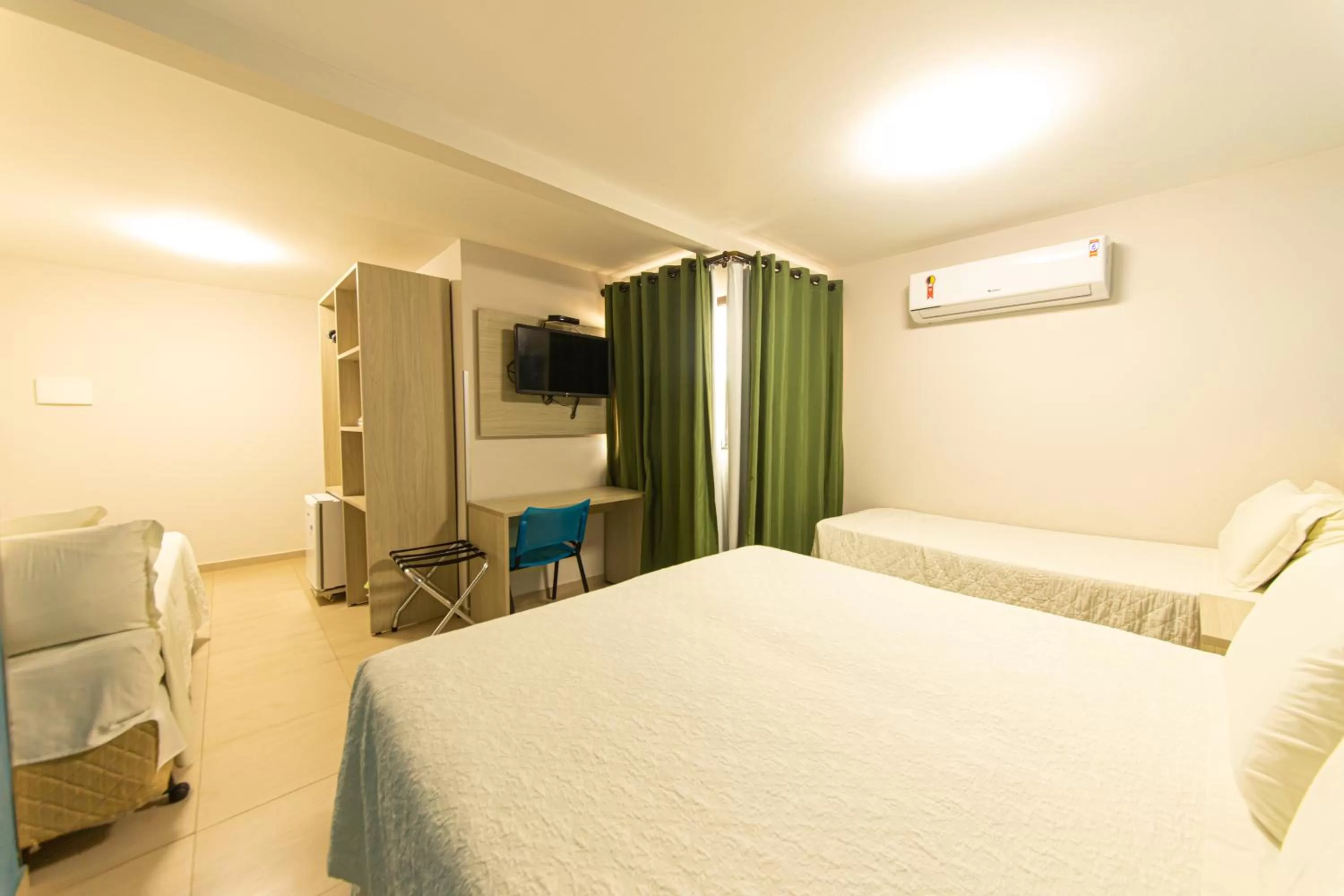 Photo of the whole room, Bed in Pousada Mariluz