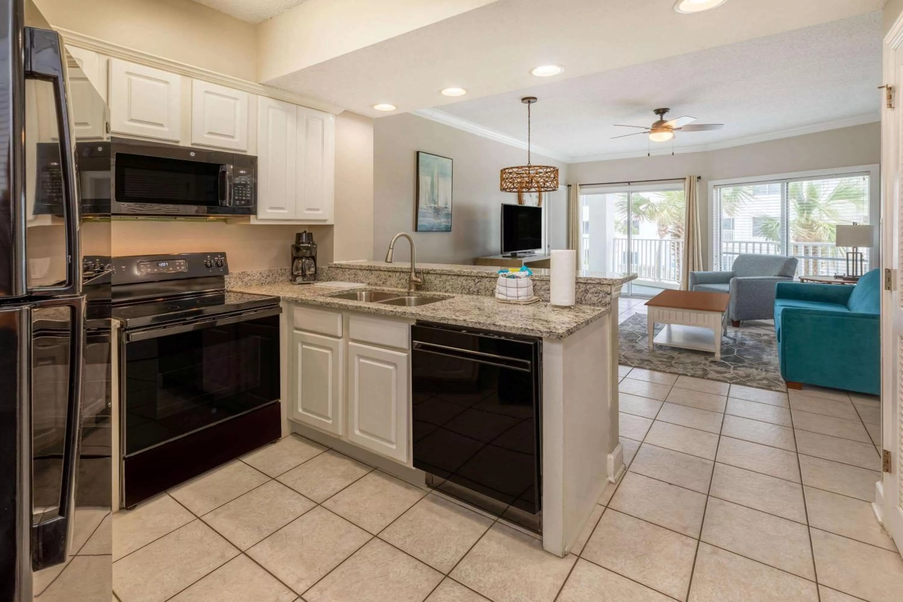 Kitchen or kitchenette in Palm Beach Resort Orange Beach a Ramada by Wyndham