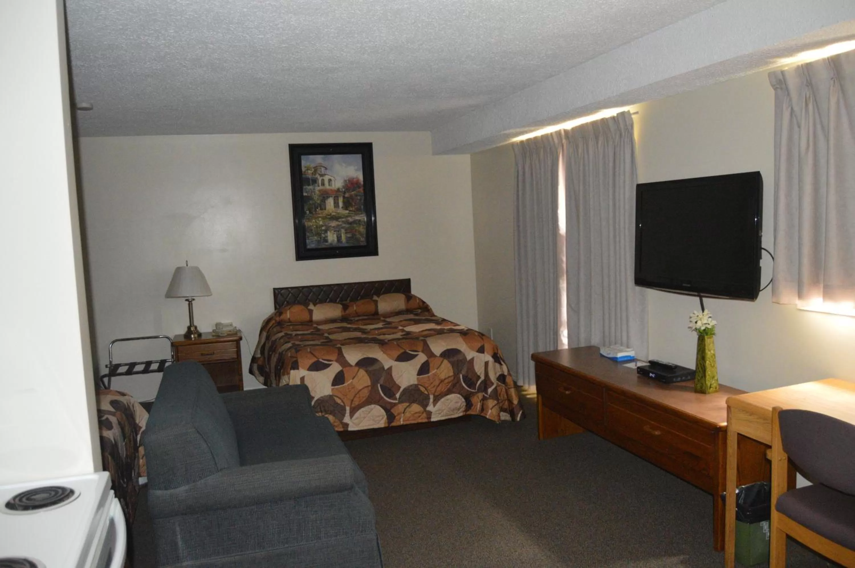 Bed in Wheel Inn Motel