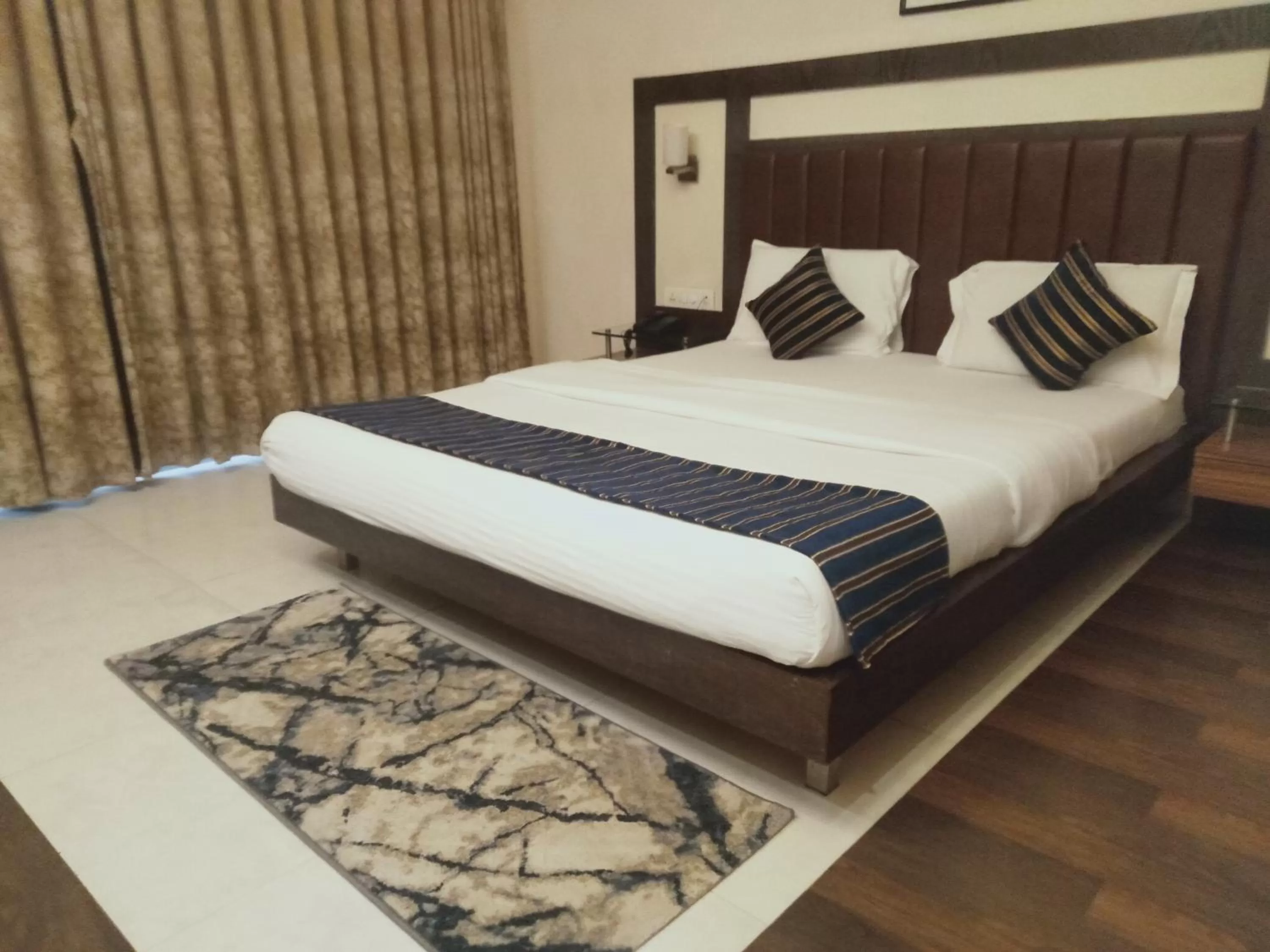 Bed in Hotel Udayanraje Palace