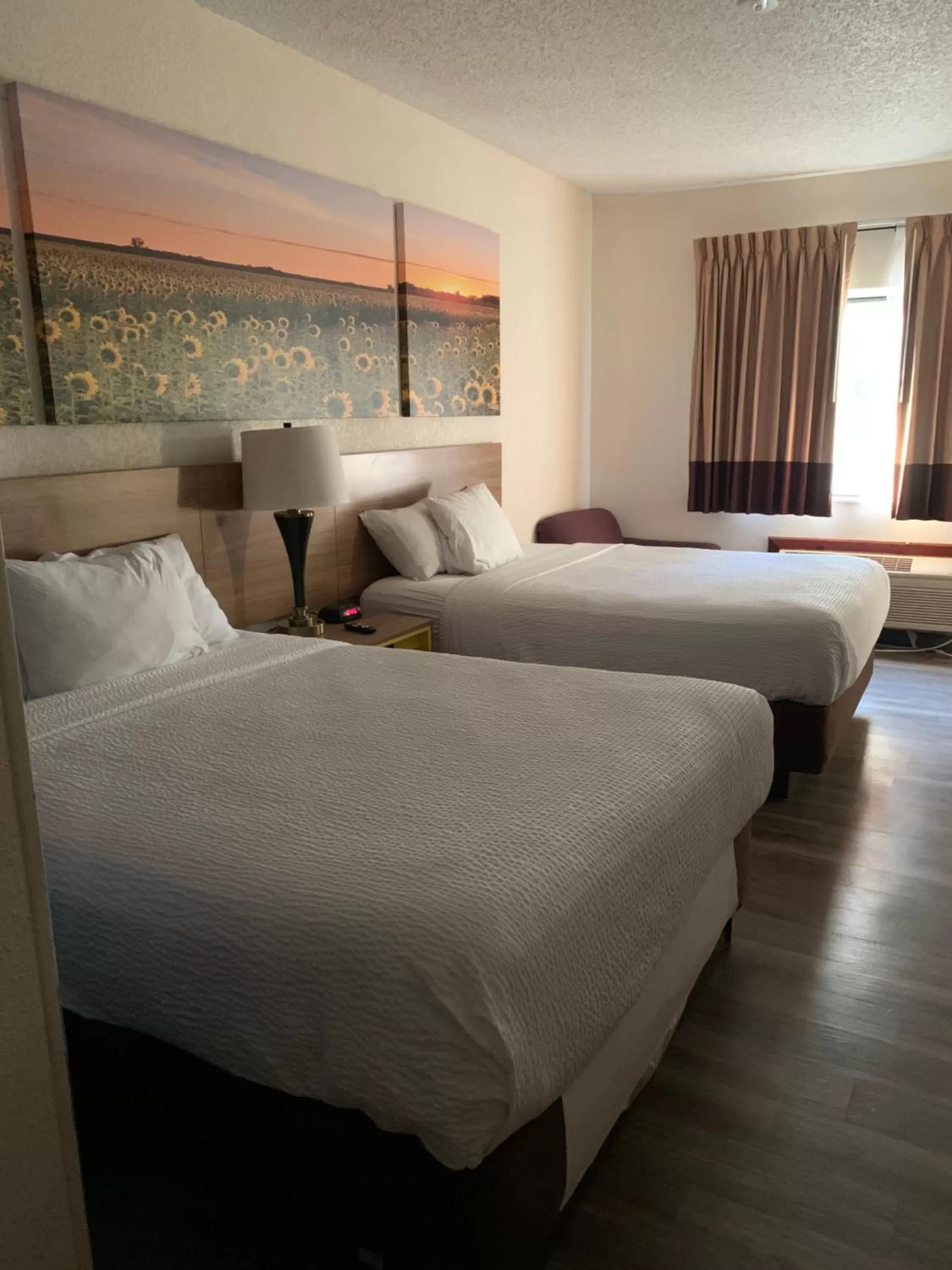 Bed in Days Inn by Wyndham Topeka