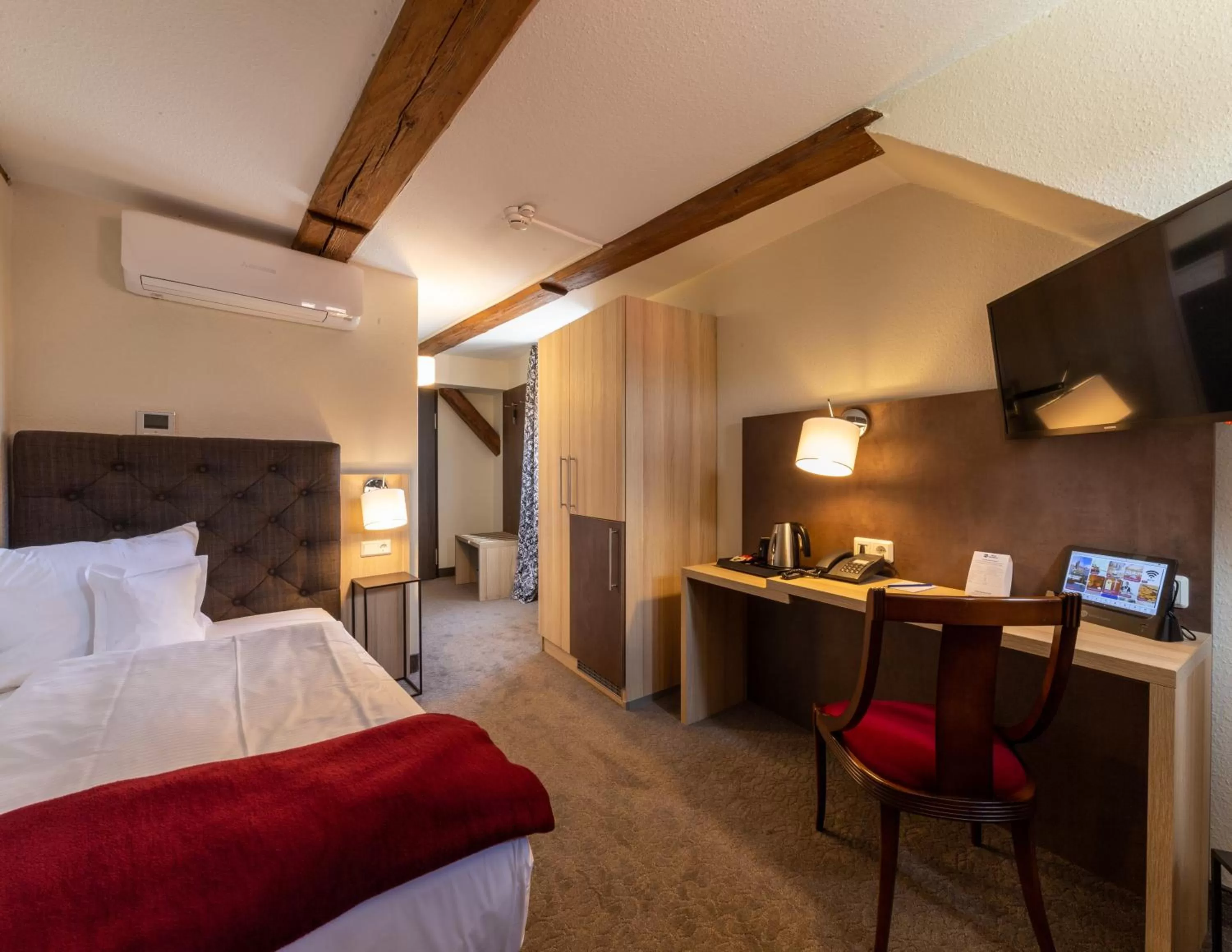 Living room, Bed in Best Western Hotel Schlossmühle Quedlinburg