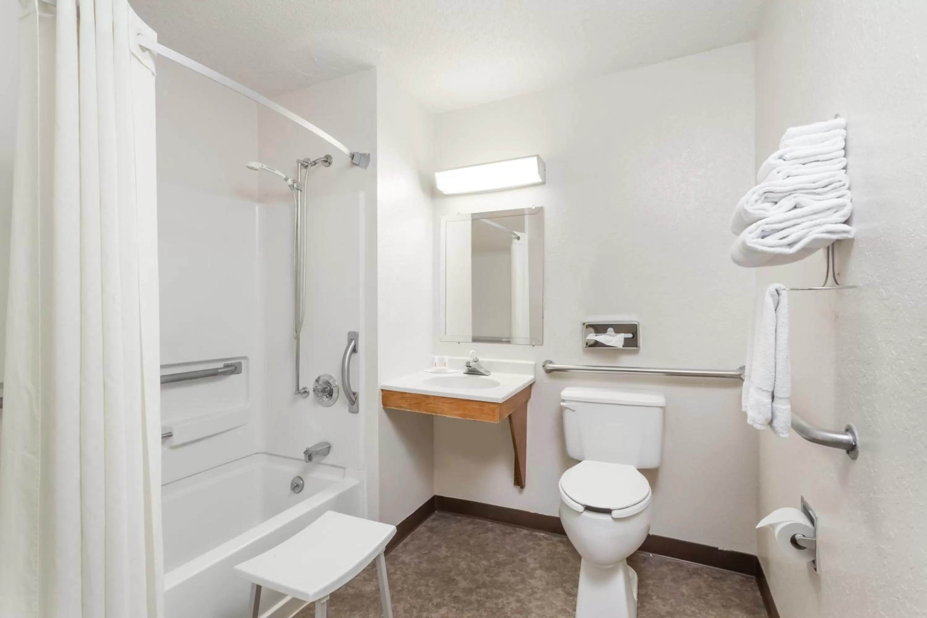 Bathroom in Super 8 by Wyndham Sidney NY