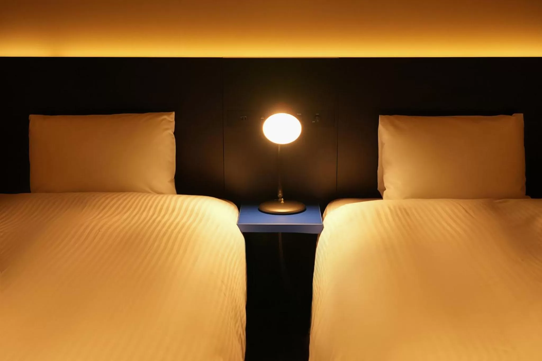 Bed in NPlus Hotel Higashikanda-akihabara