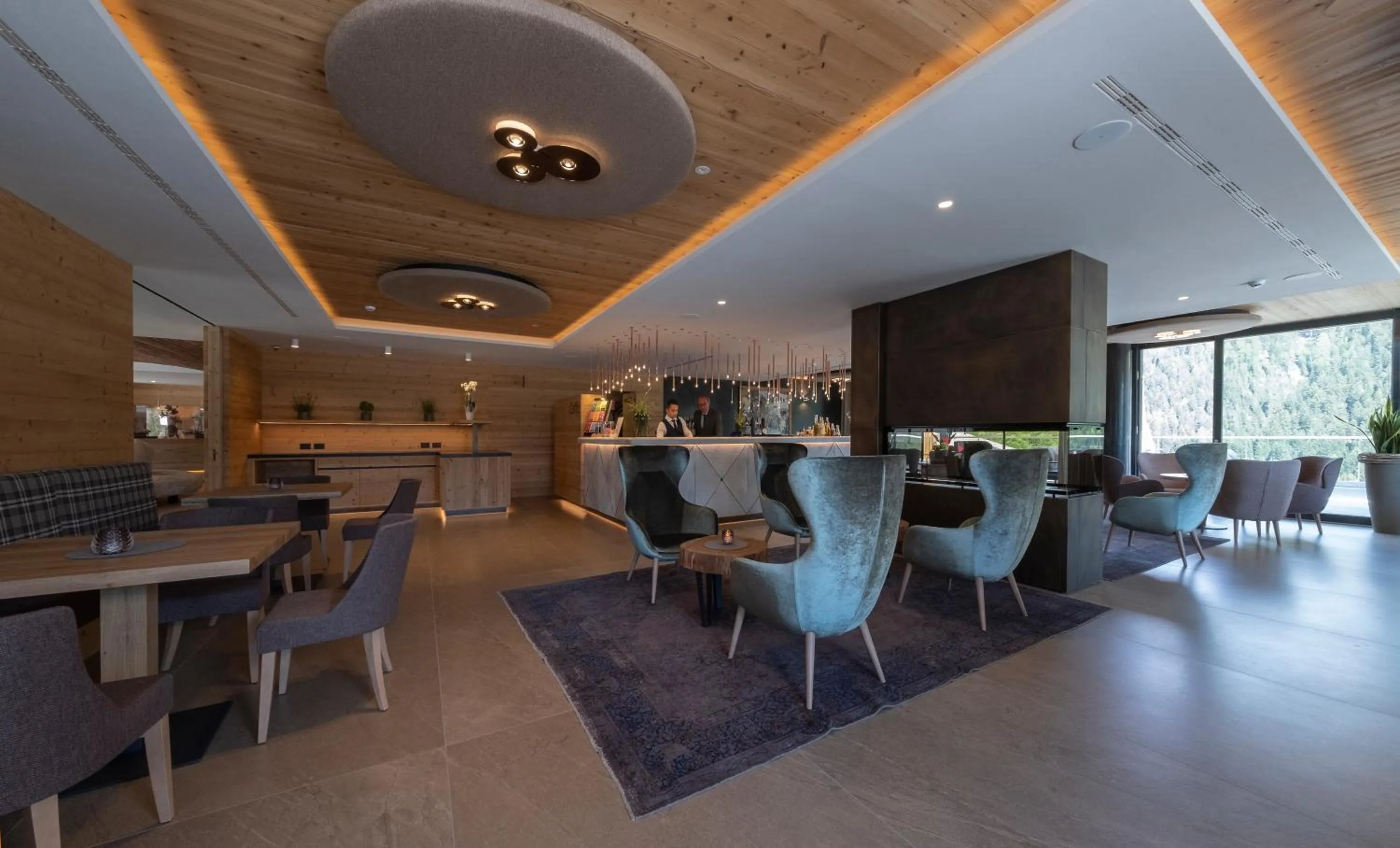 Lounge or bar in Ciampedie Luxury Alpine Spa Hotel