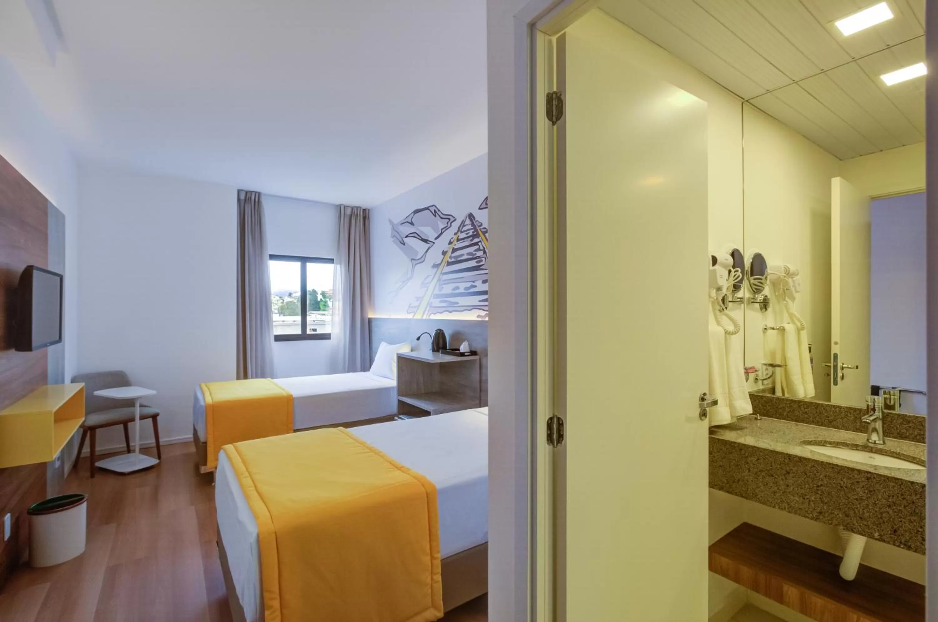 Photo of the whole room in Ramada Encore Cruzeiro