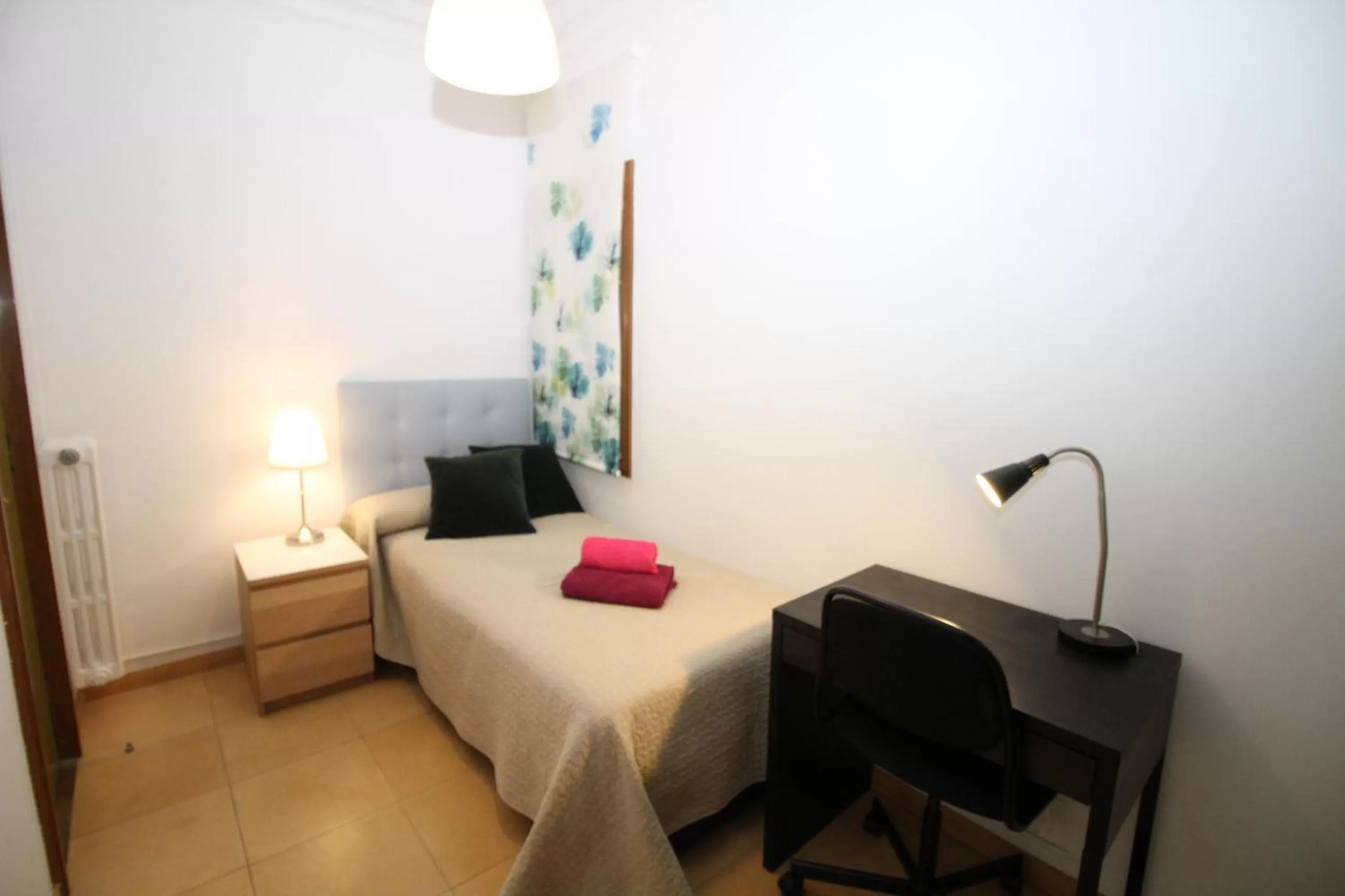 Bed in Nuevo Balmes Habitaciones