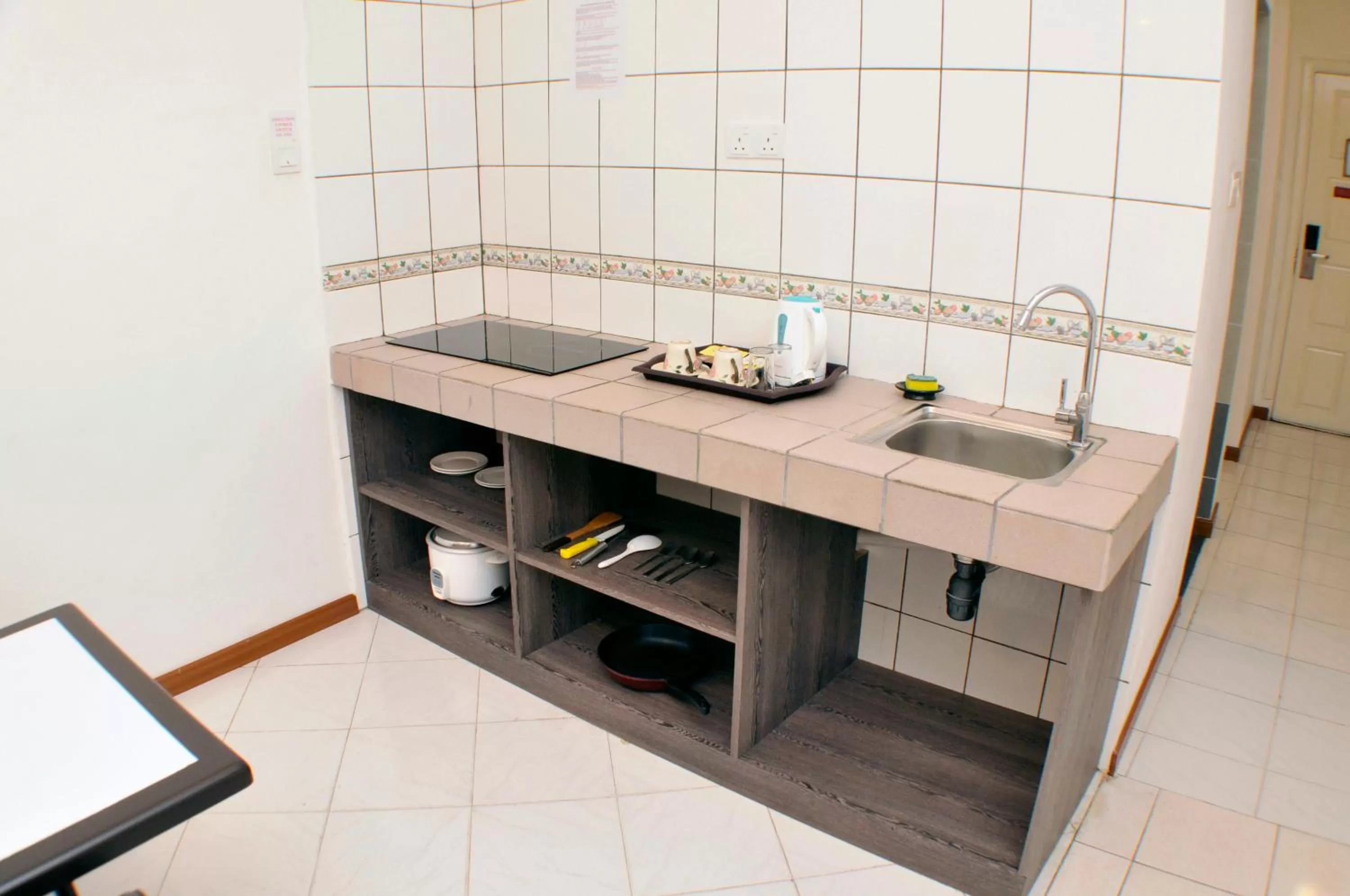 Kitchen or kitchenette in Promenade Service Apartment