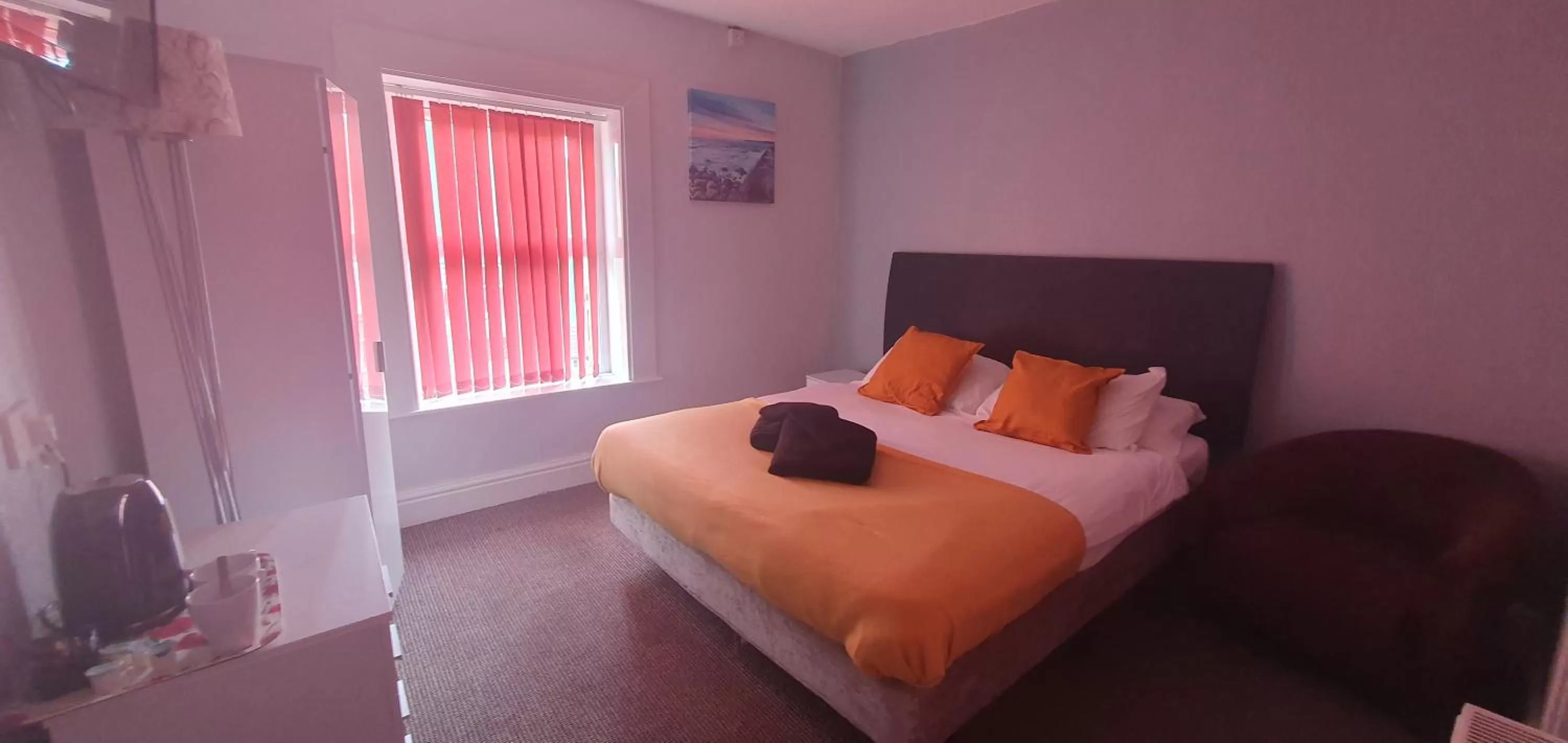 Bed in Palm Beach Hotel by the Sea