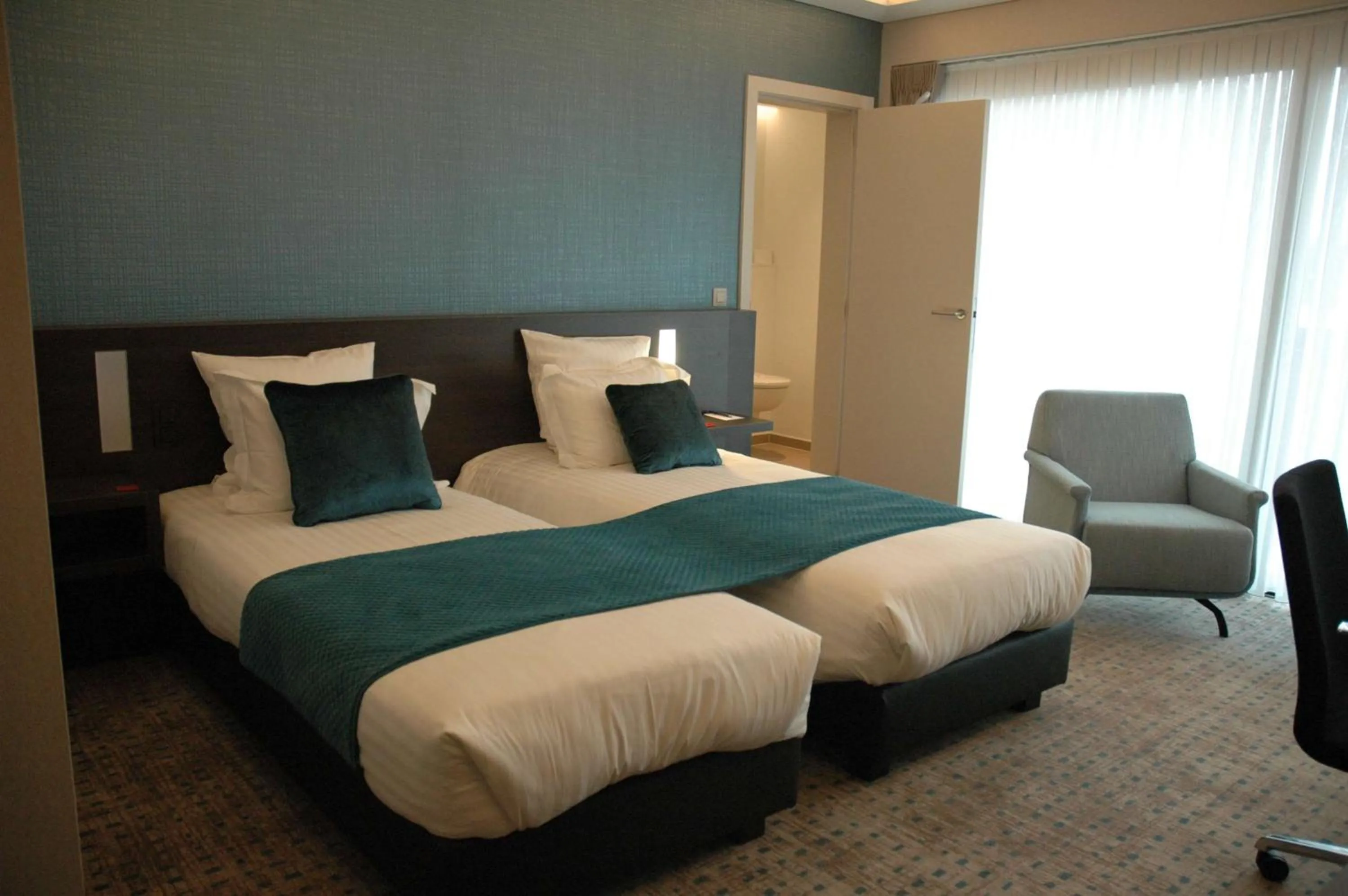 Photo of the whole room, Bed in Hotel Restaurant Weinebrugge