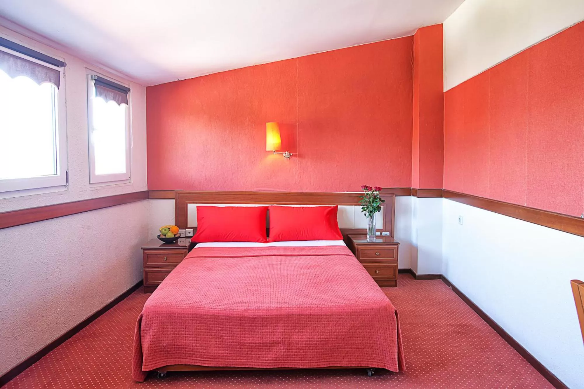 Property building, Bed in Anastassiou Hotel - Bike and motorcycle friendly hotel