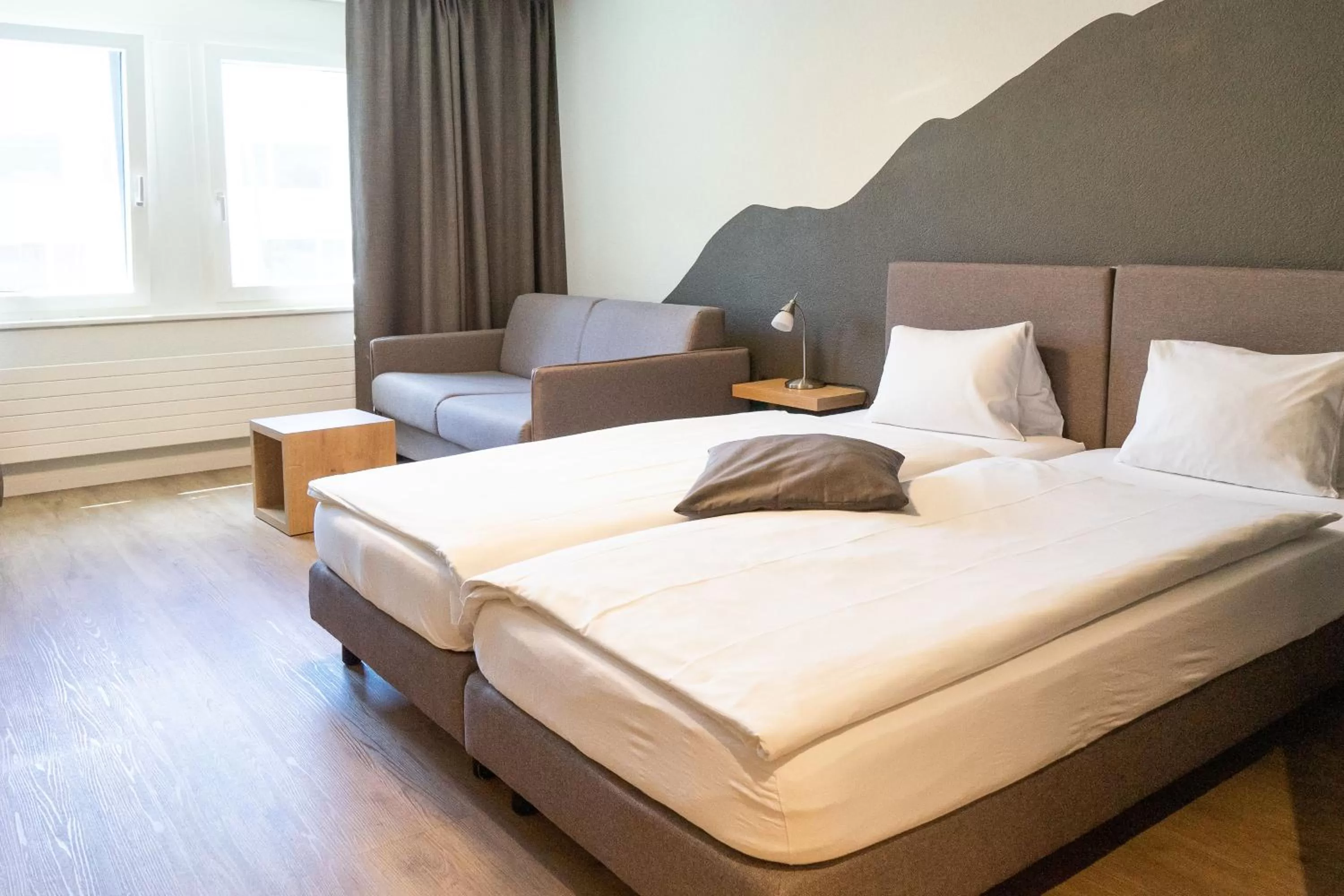 Bed in Tailormade Hotel STANS SÜD