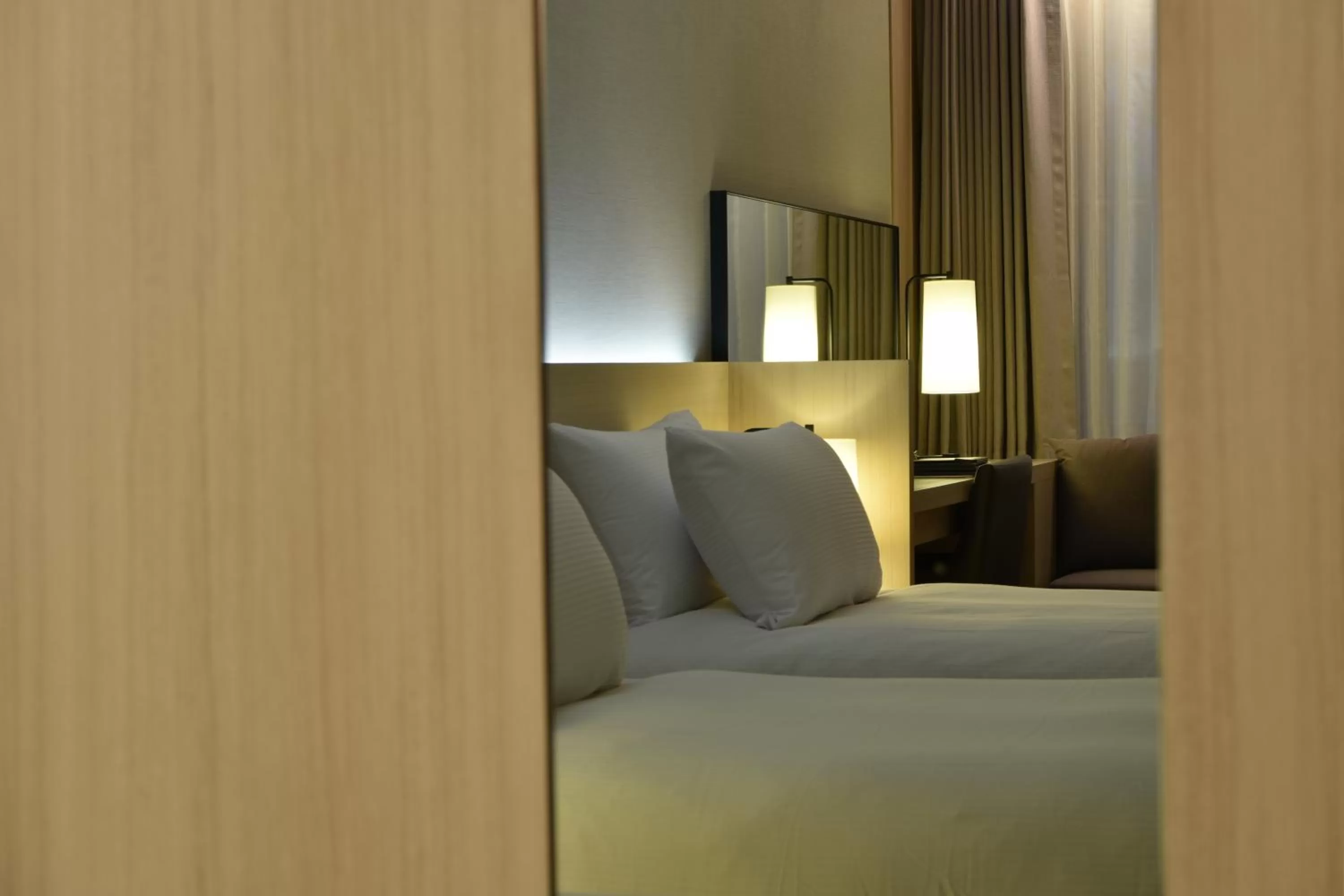 Bedroom in Pacific Hotel