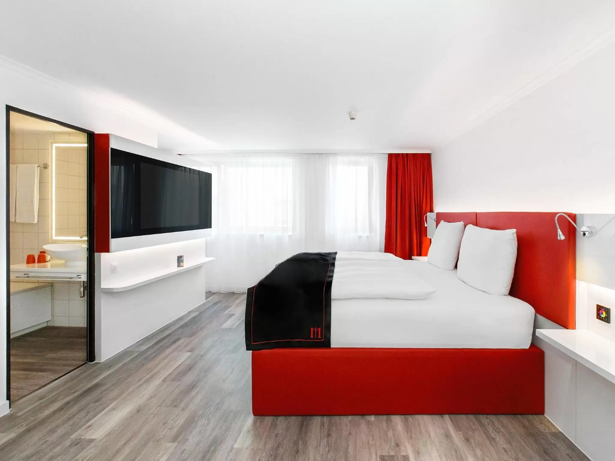 Photo of the whole room, Bed in DORMERO Hotel Zürich Airport