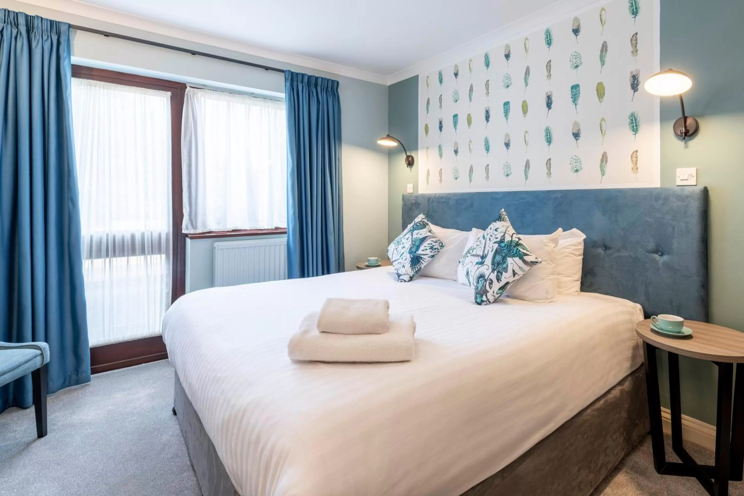 Bed in Wisteria Hotel