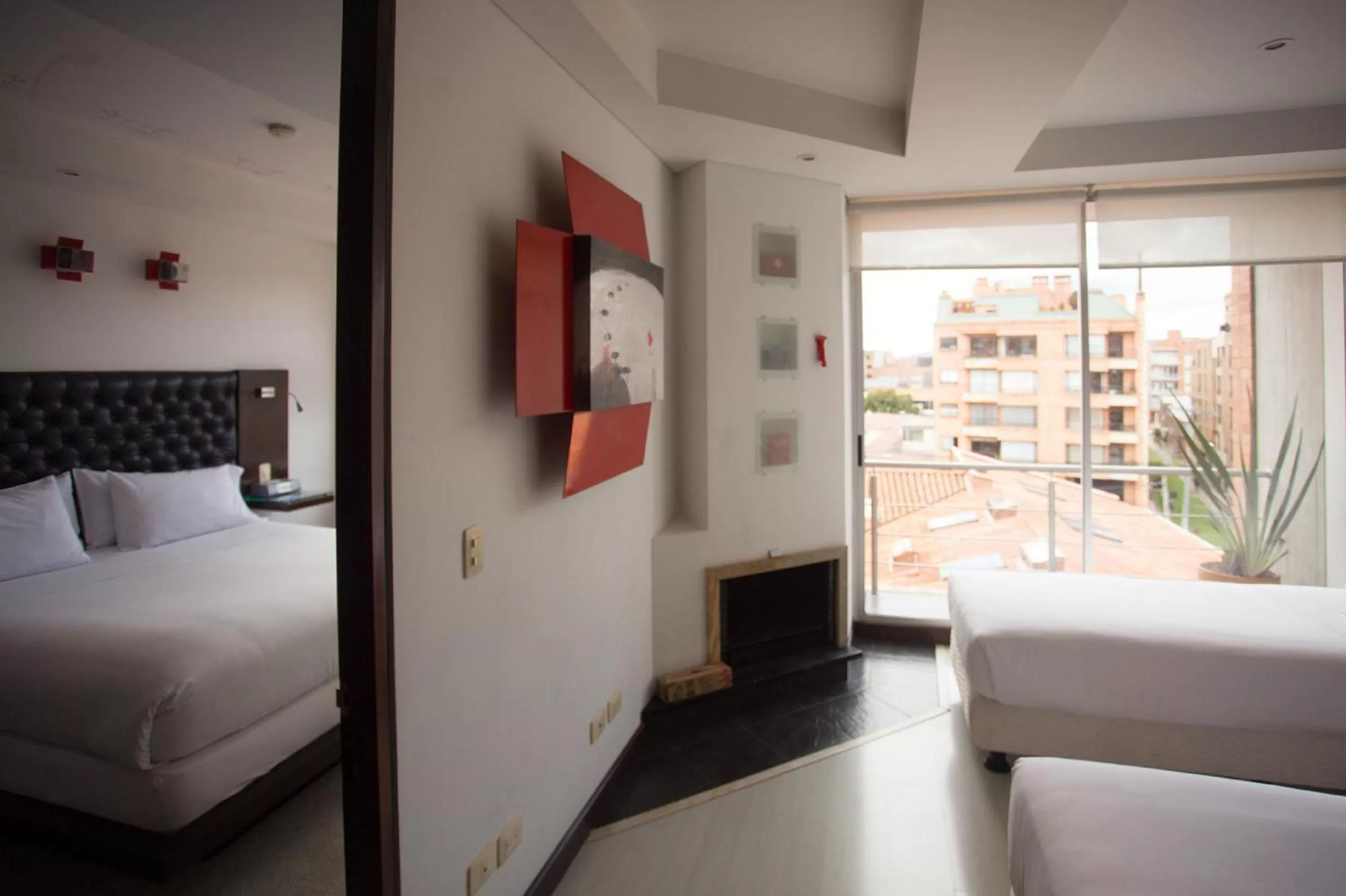 Bed in Hotel 104 Art Suites