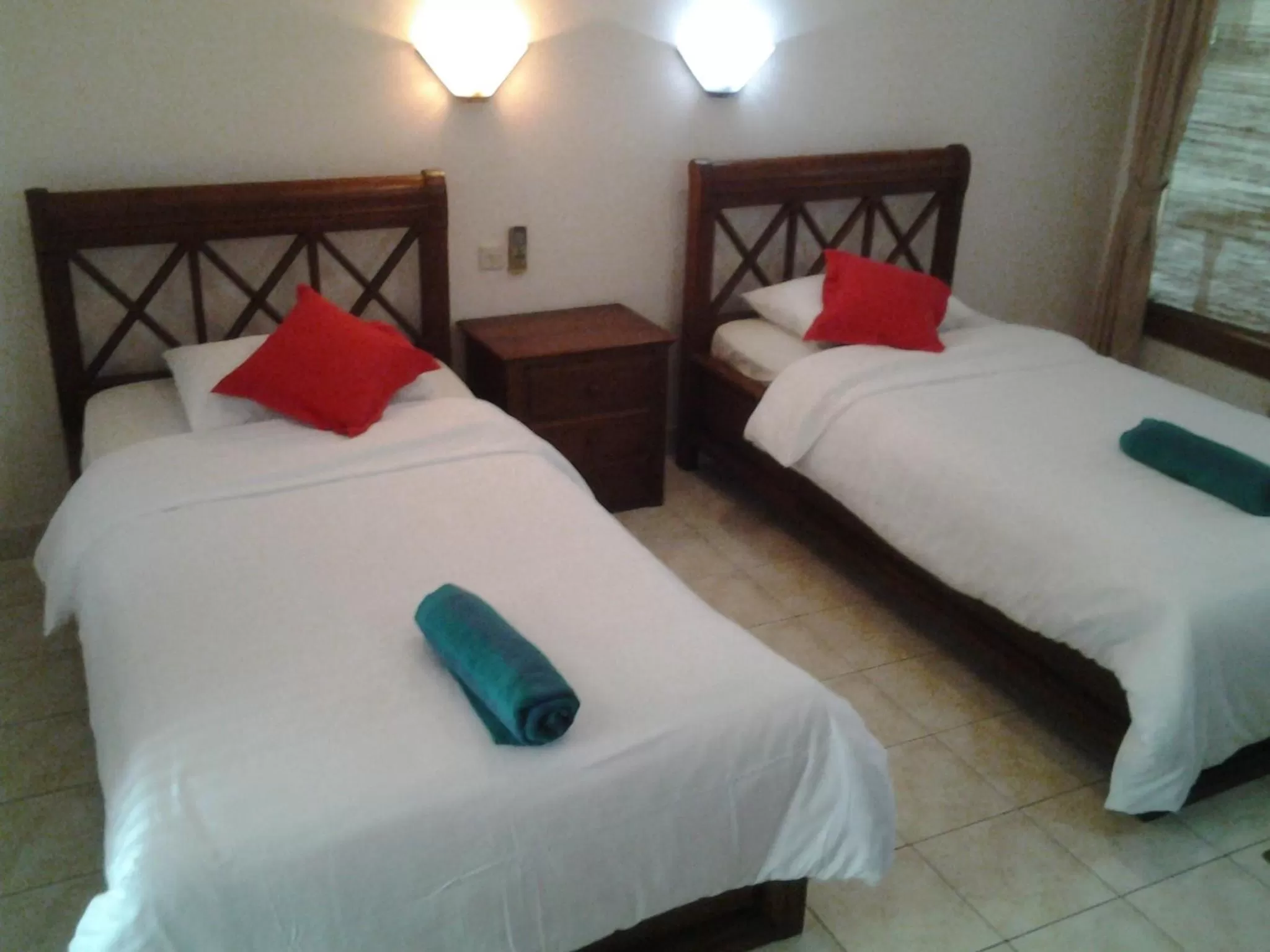 Bed in Nirwana Sea Side Cottages