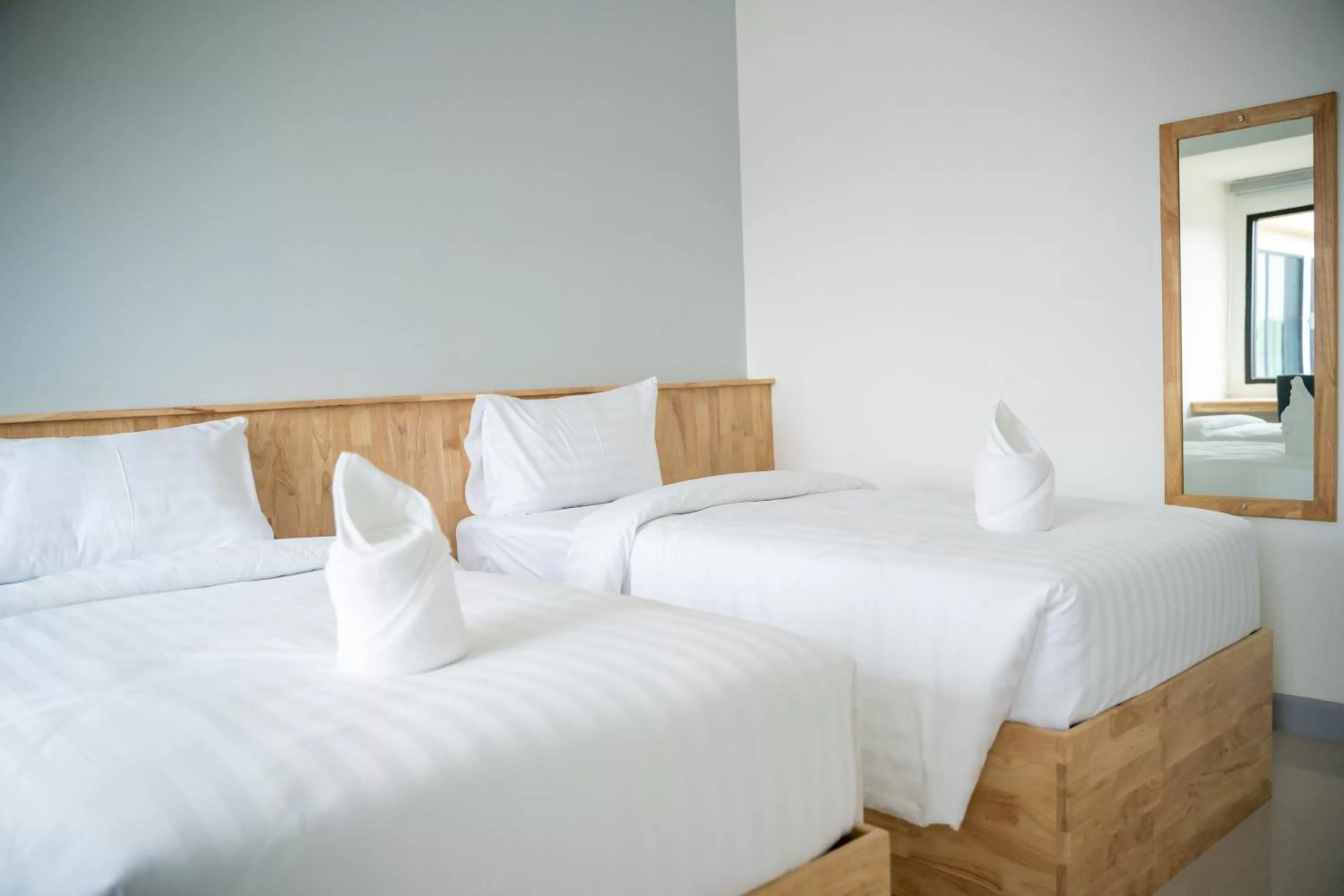 Bed in Meesuk ChiangRai Hotel, SHA Certified