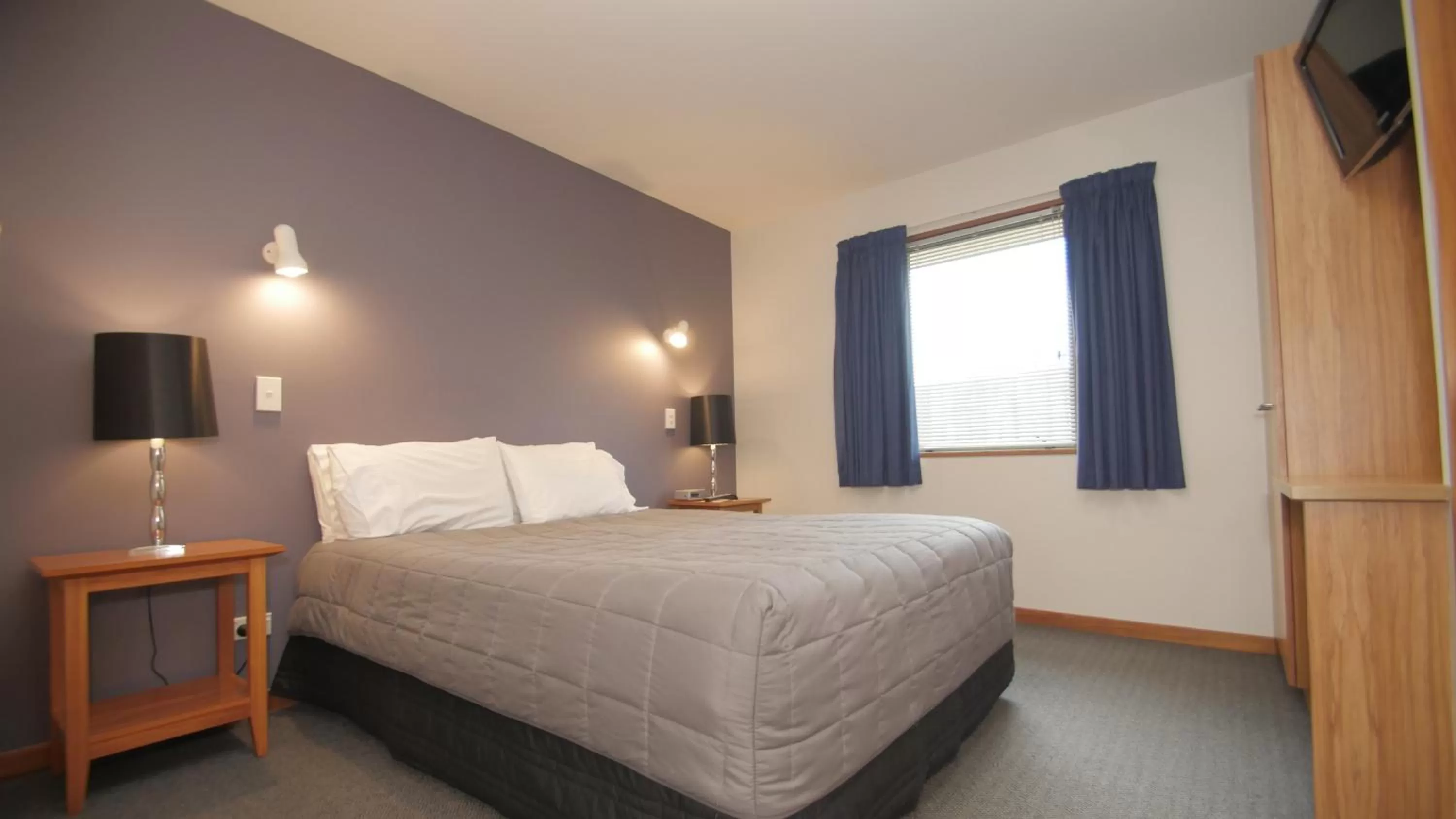 Bed in ASURE Christchurch Classic Motel & Apartments