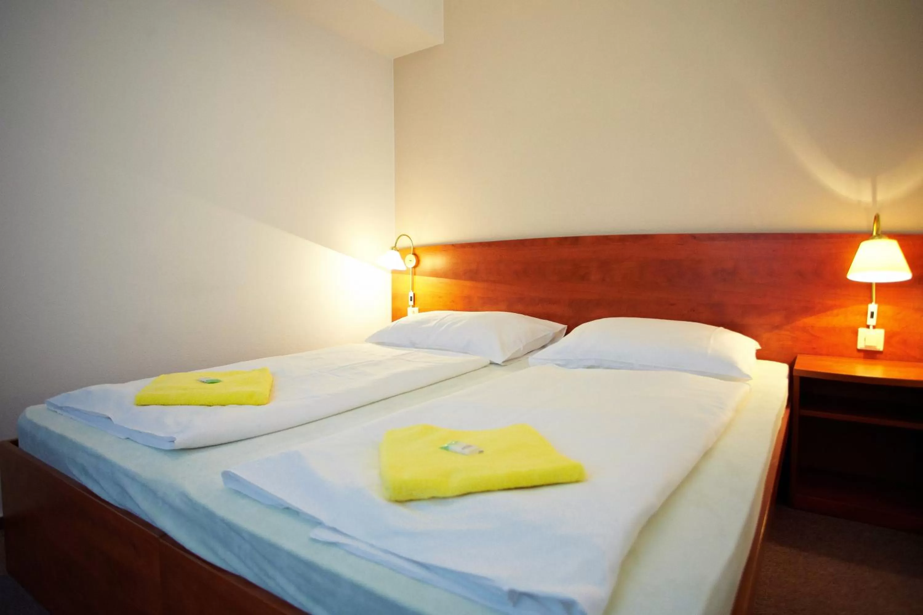 Bedroom, Bed in Wellness Hotel Central