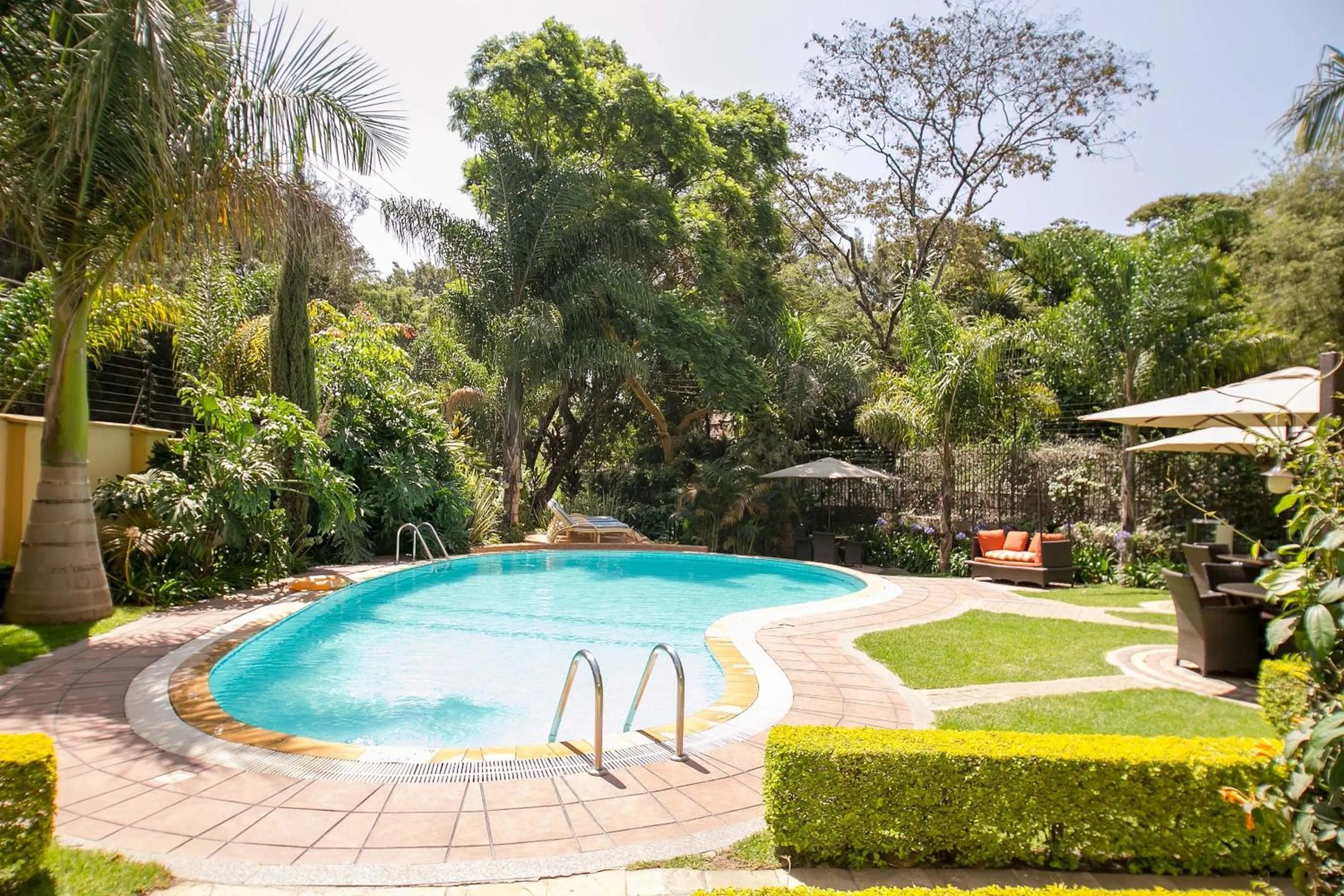 Swimming pool in Waridi Paradise Hotel and Suites