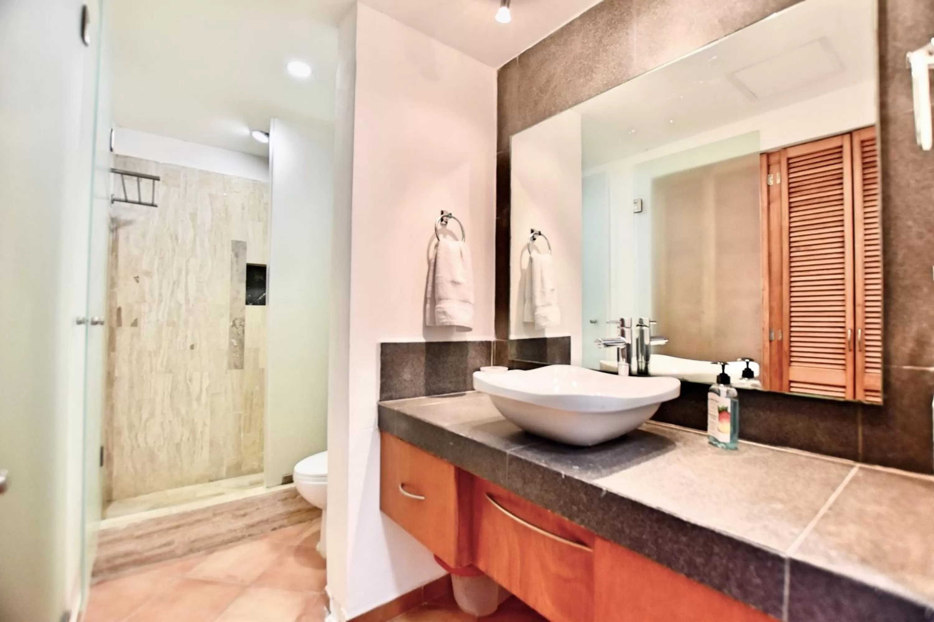 Bathroom in Solymar Condo Beach Resort by Casago