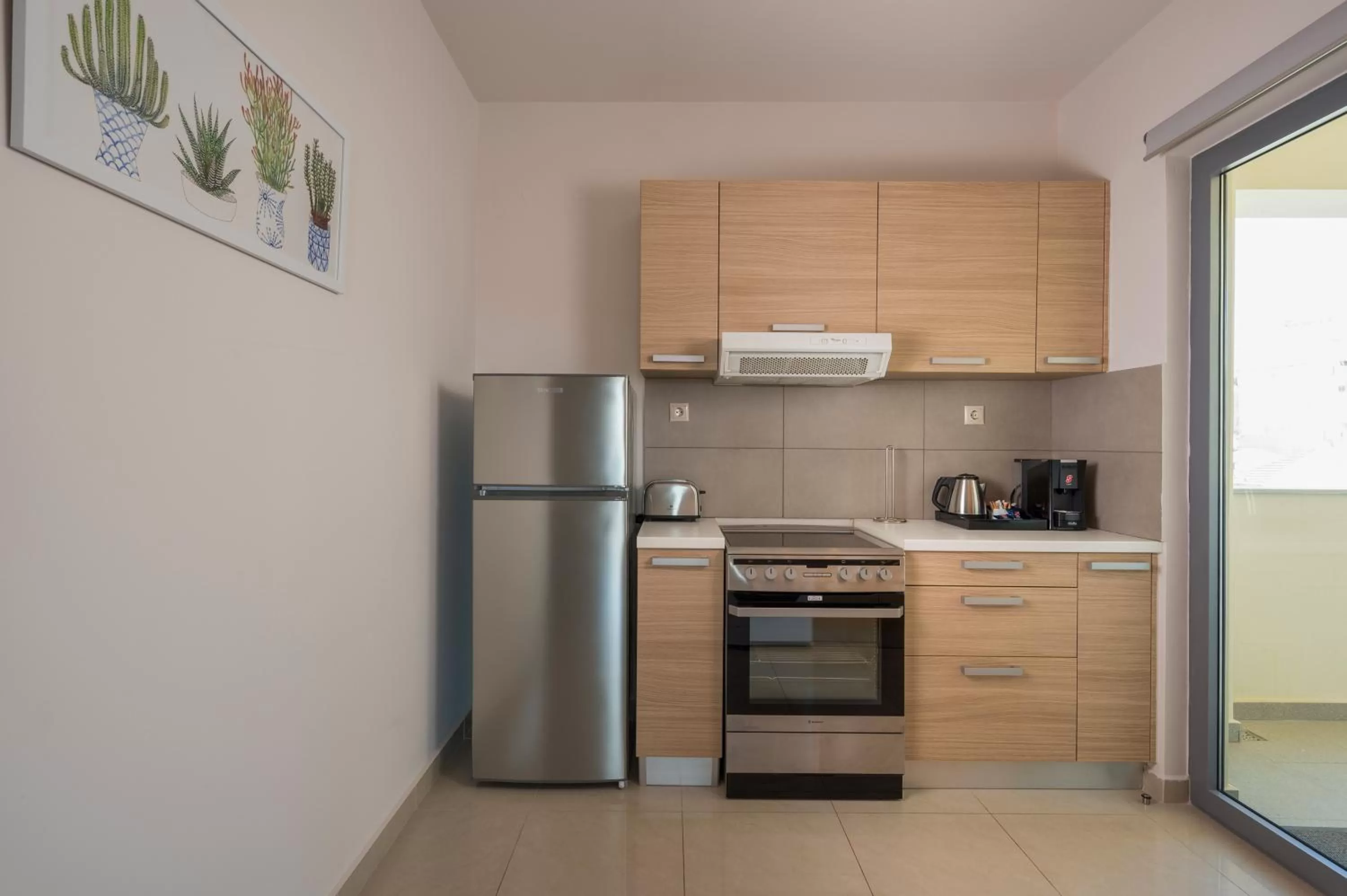 Kitchen or kitchenette in Trianon Luxury Apartments & Suites