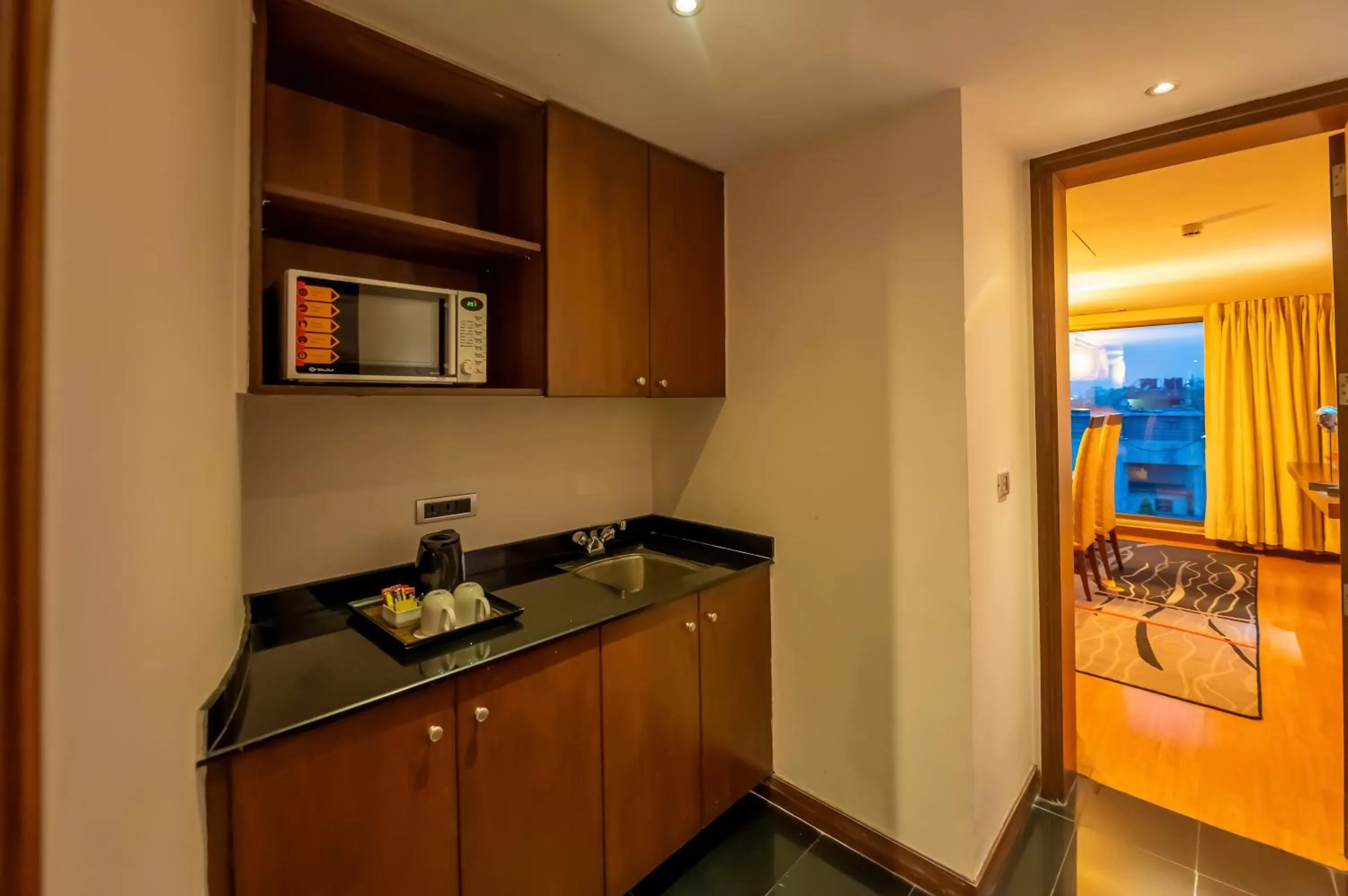 Kitchen or kitchenette in O Hotel Pune