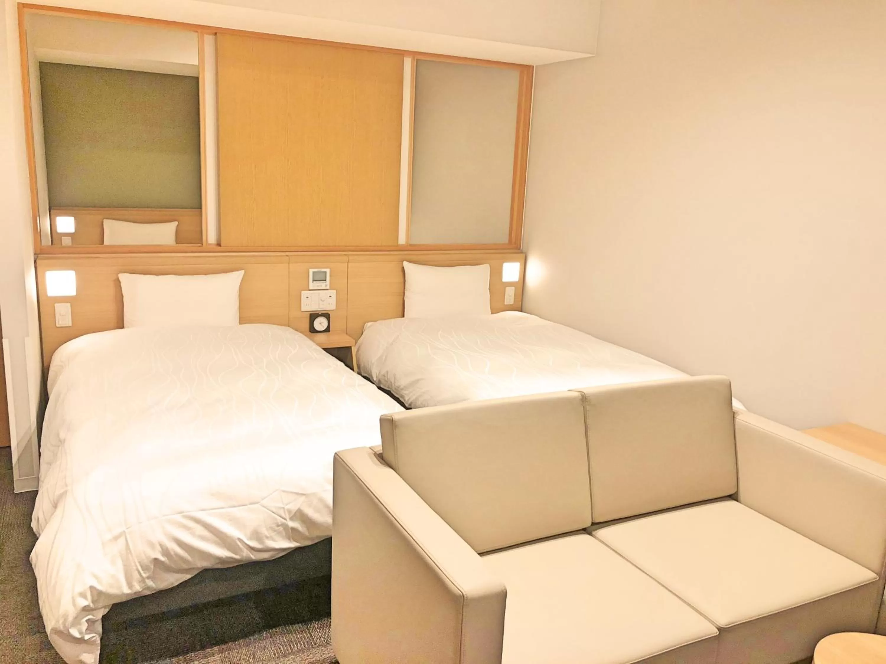 Bed in La Vista Furano Hills Natural Hot Spring