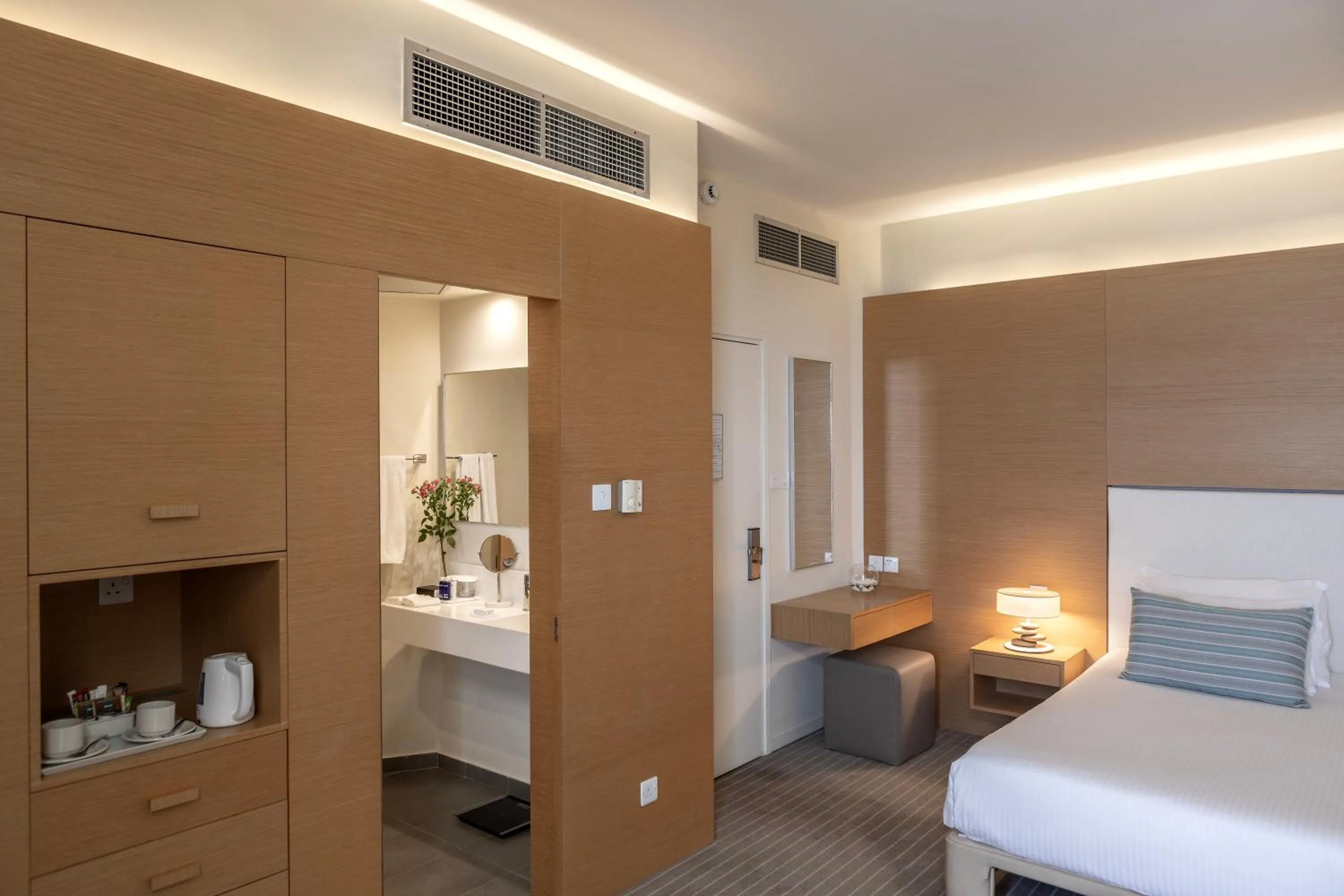 Bed in Capo Bay Hotel