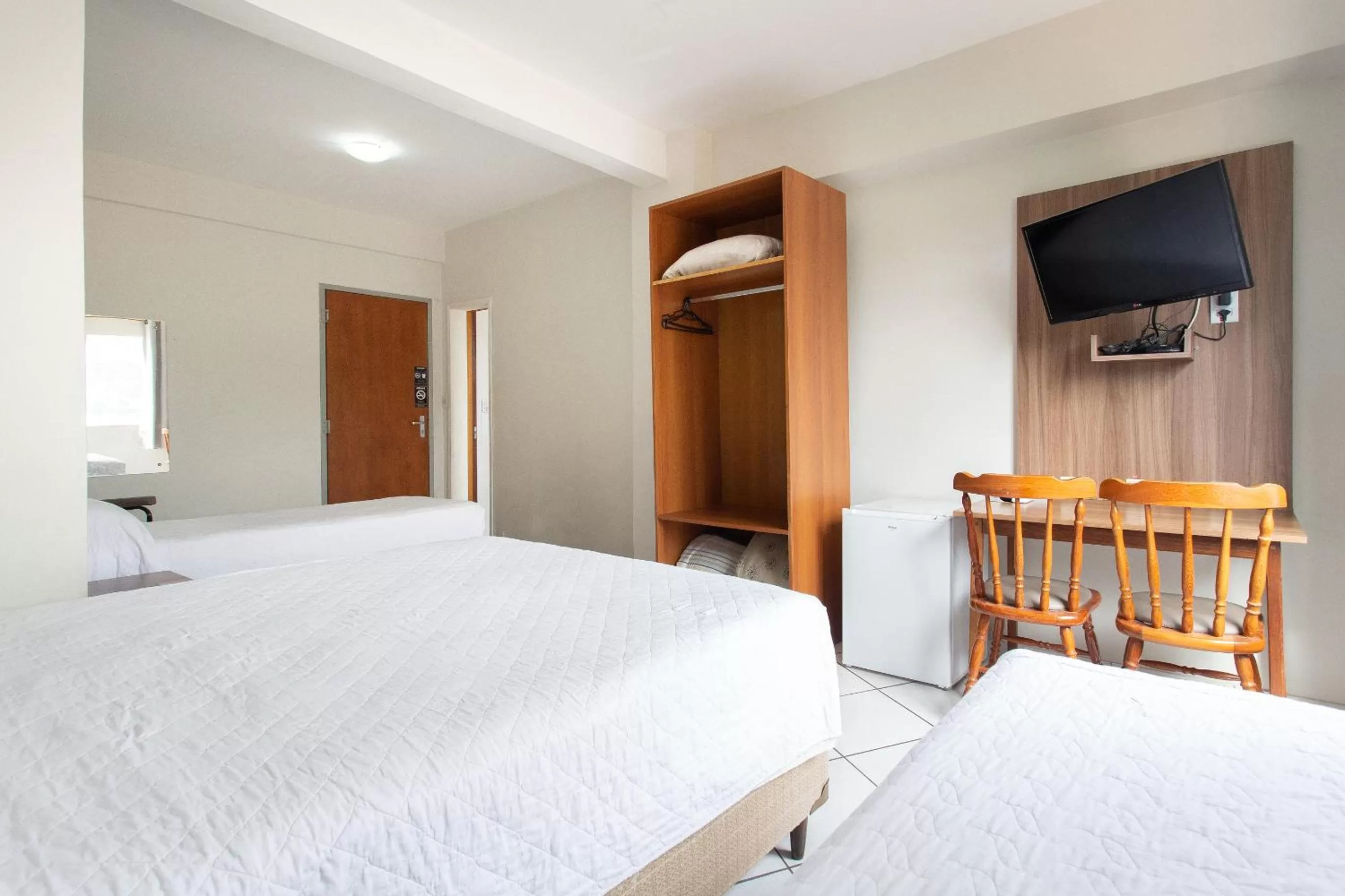 Bed in Hotel Dom Rafael Express