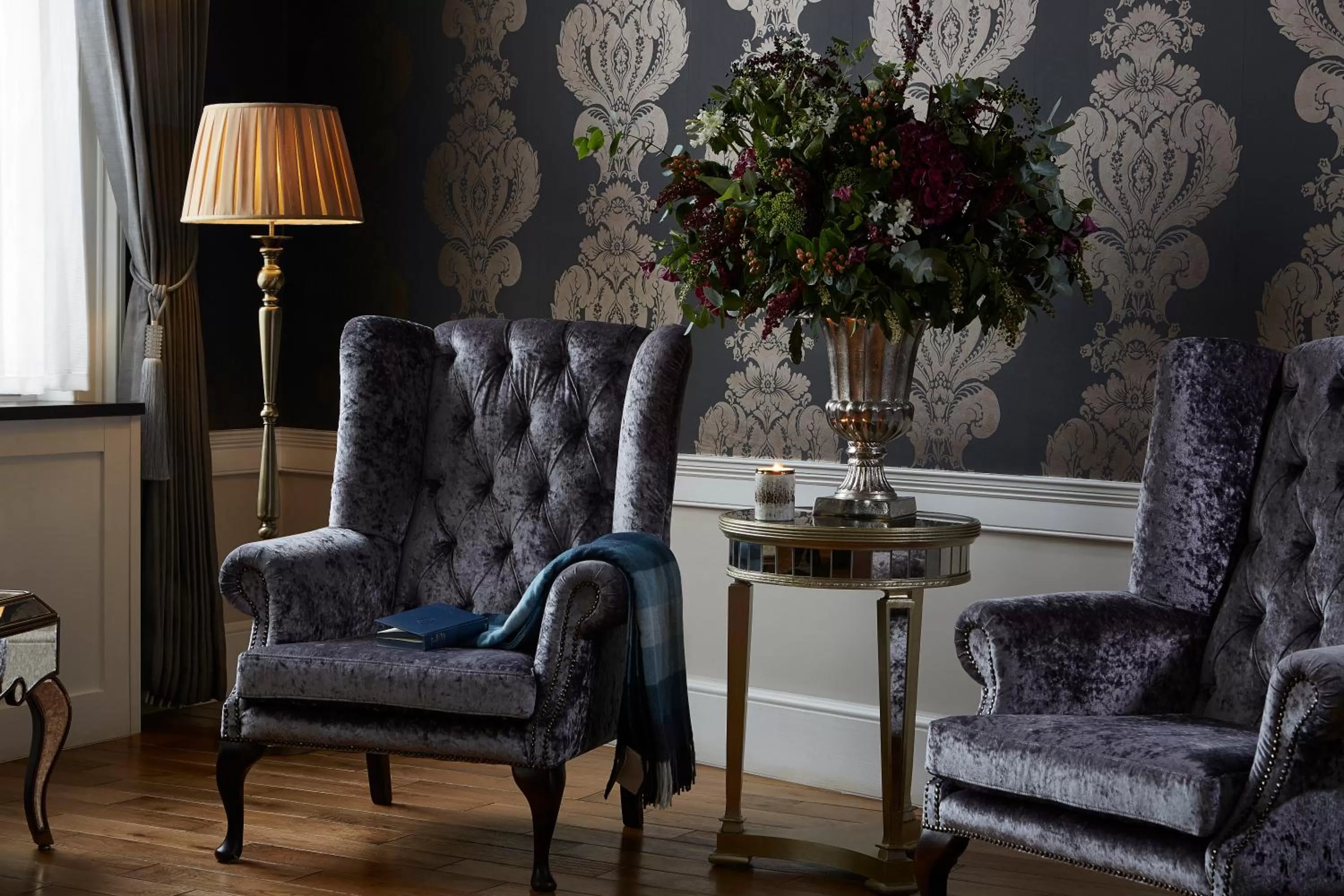 Communal lounge/ TV room in The Westbridge Hotel Stratford