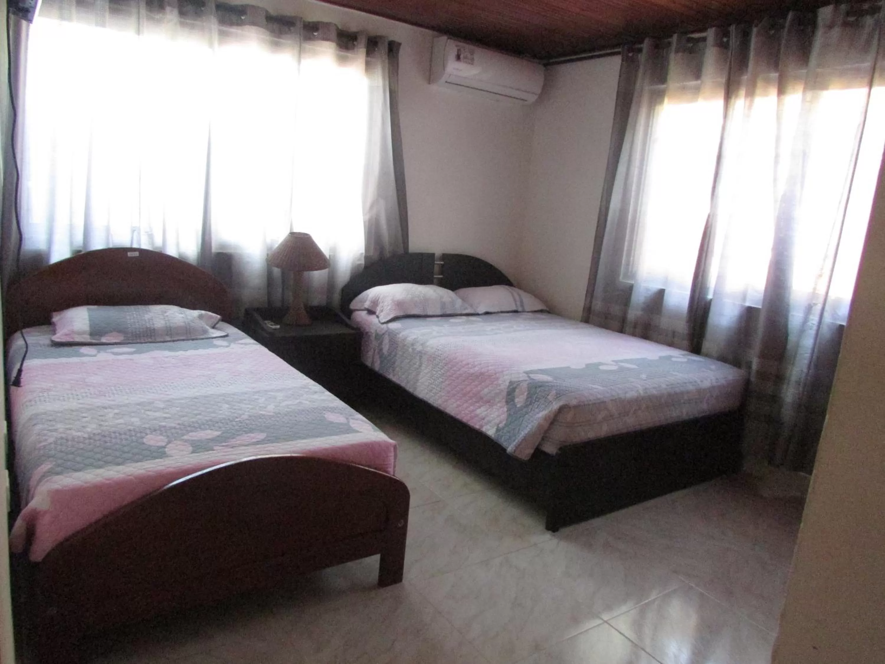Photo of the whole room, Bed in Posada Hostal Miss Marlly