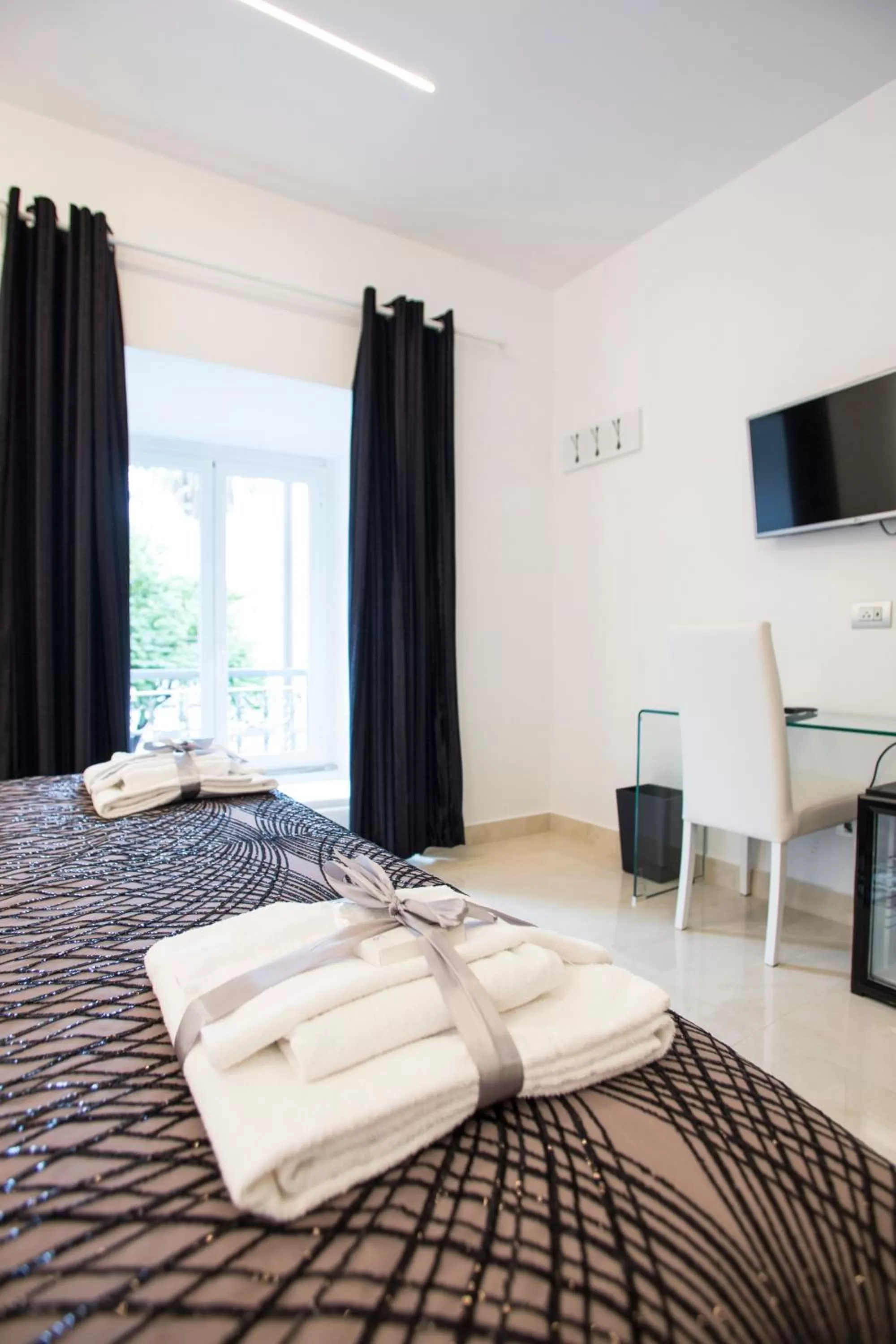 Bed in San Pietro Grand Suite