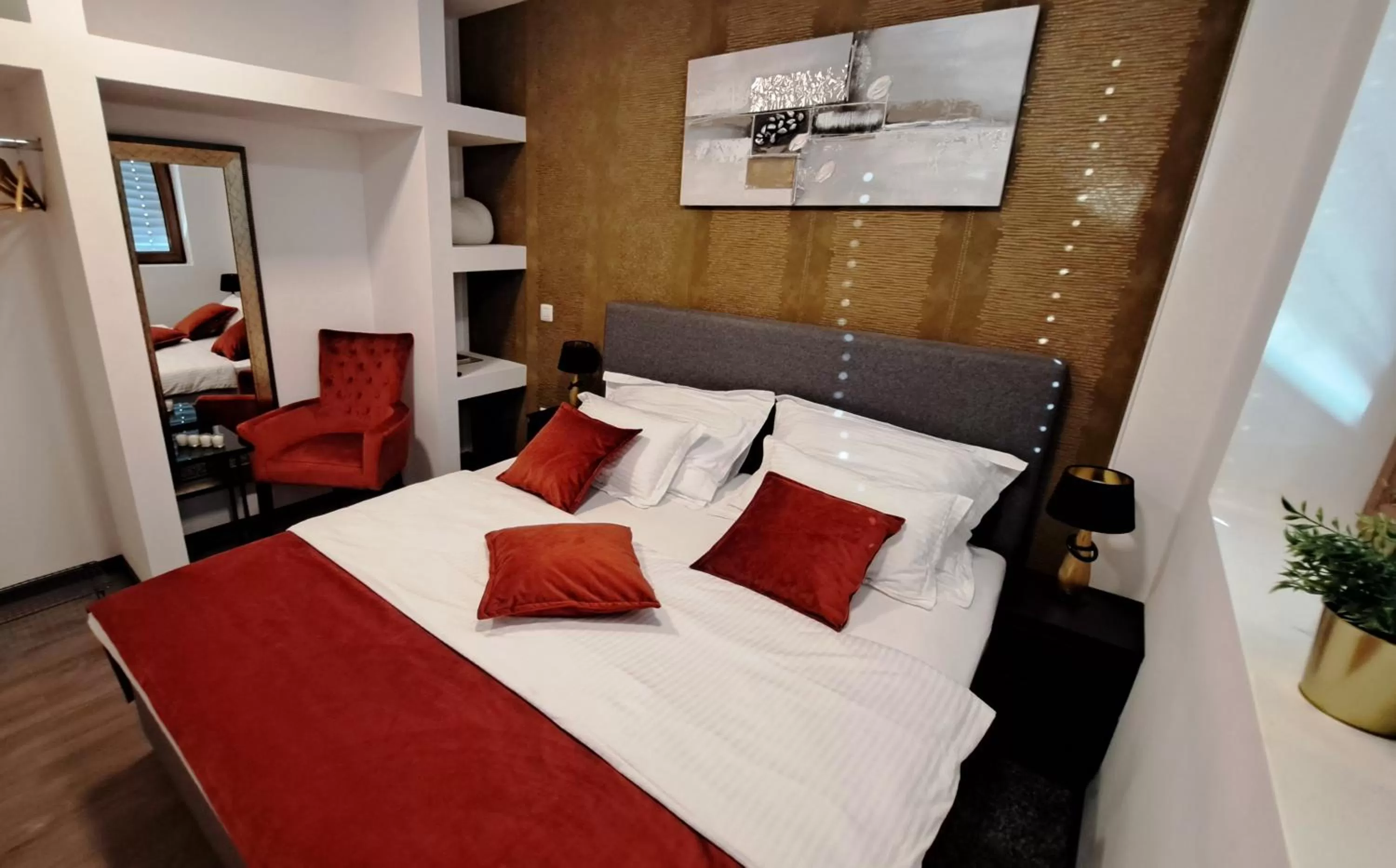 Bed in Arcobaleno Apartments & Rooms