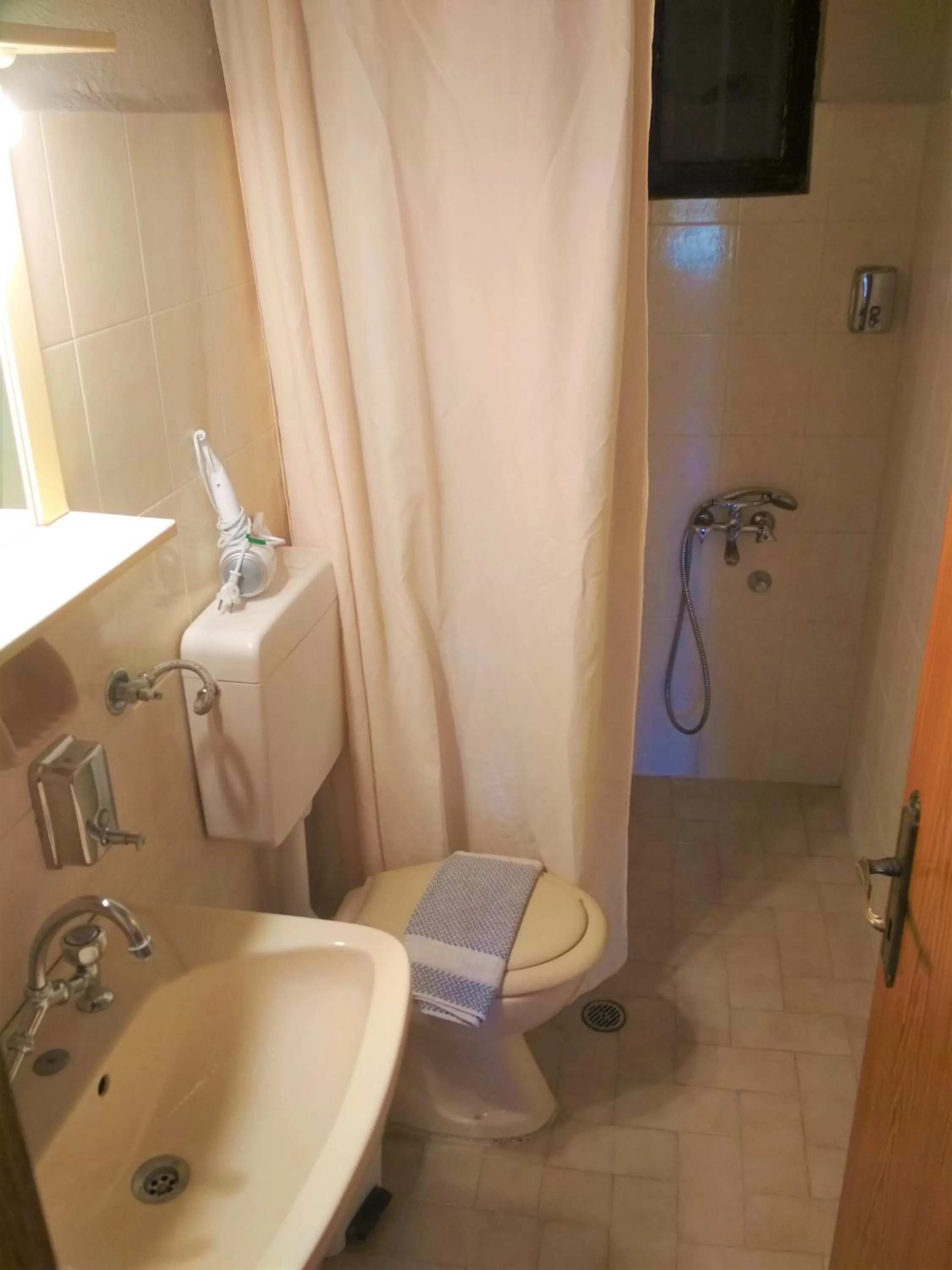 Bathroom in Georgios Rooms