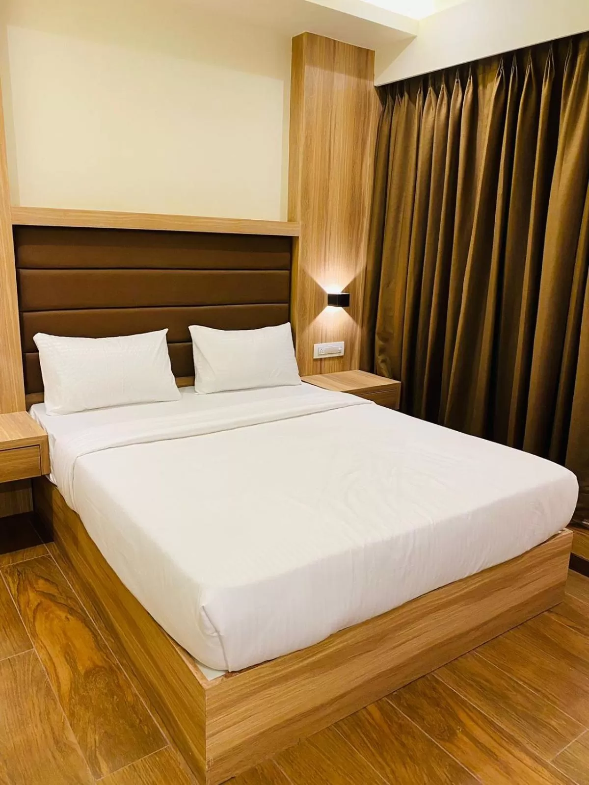 Bed in Hotel Plaza Heights by RAK Rooms, Mangaluru