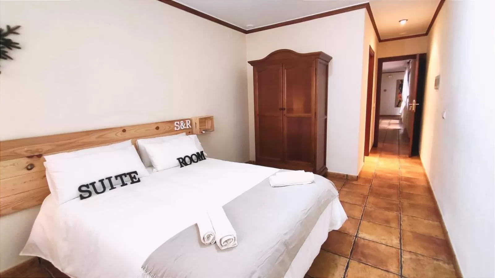 Bed in El Bosque Suites&Room