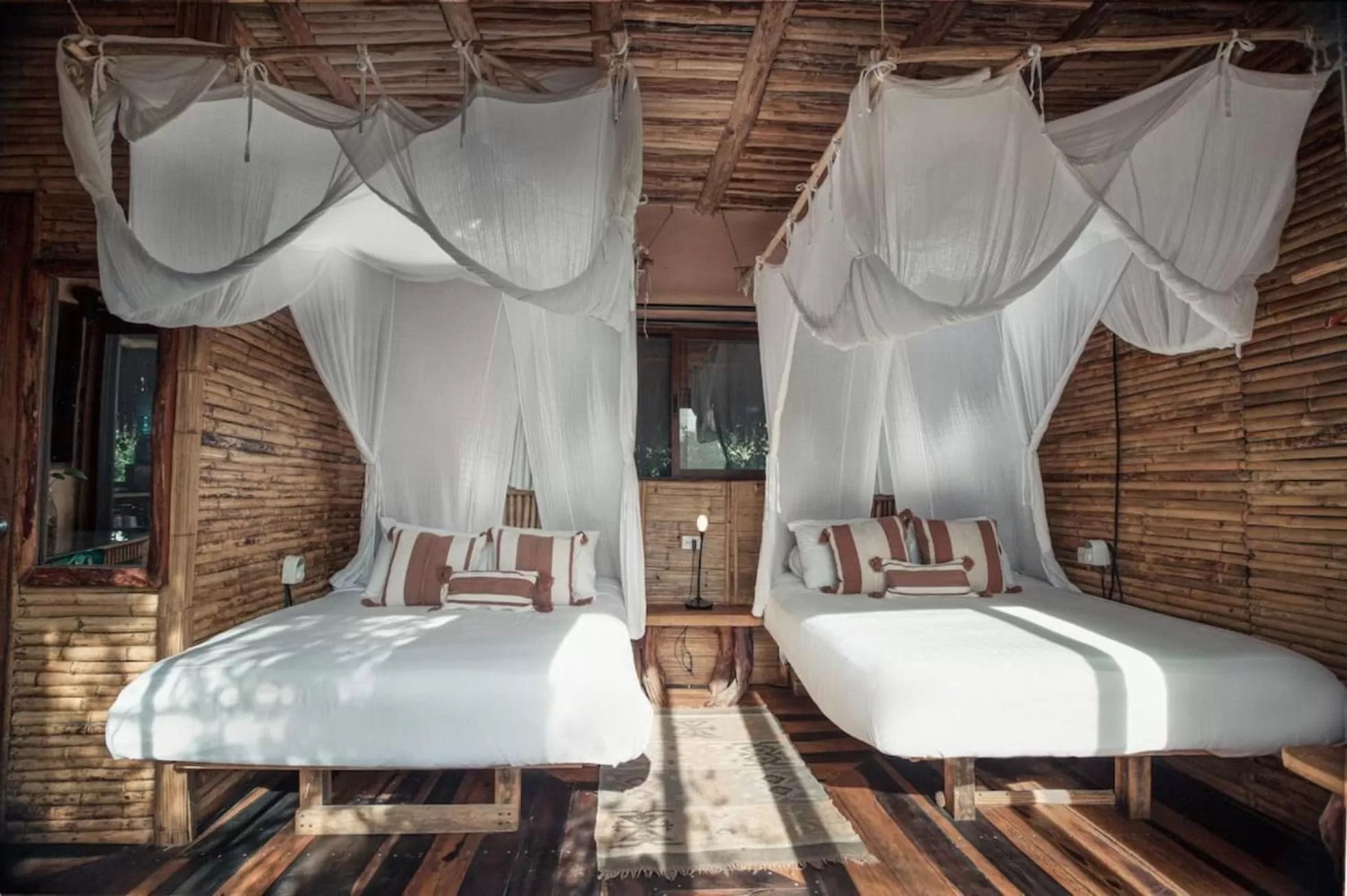 Bed in Hidden Treehouse Tulum Eco-Hotel