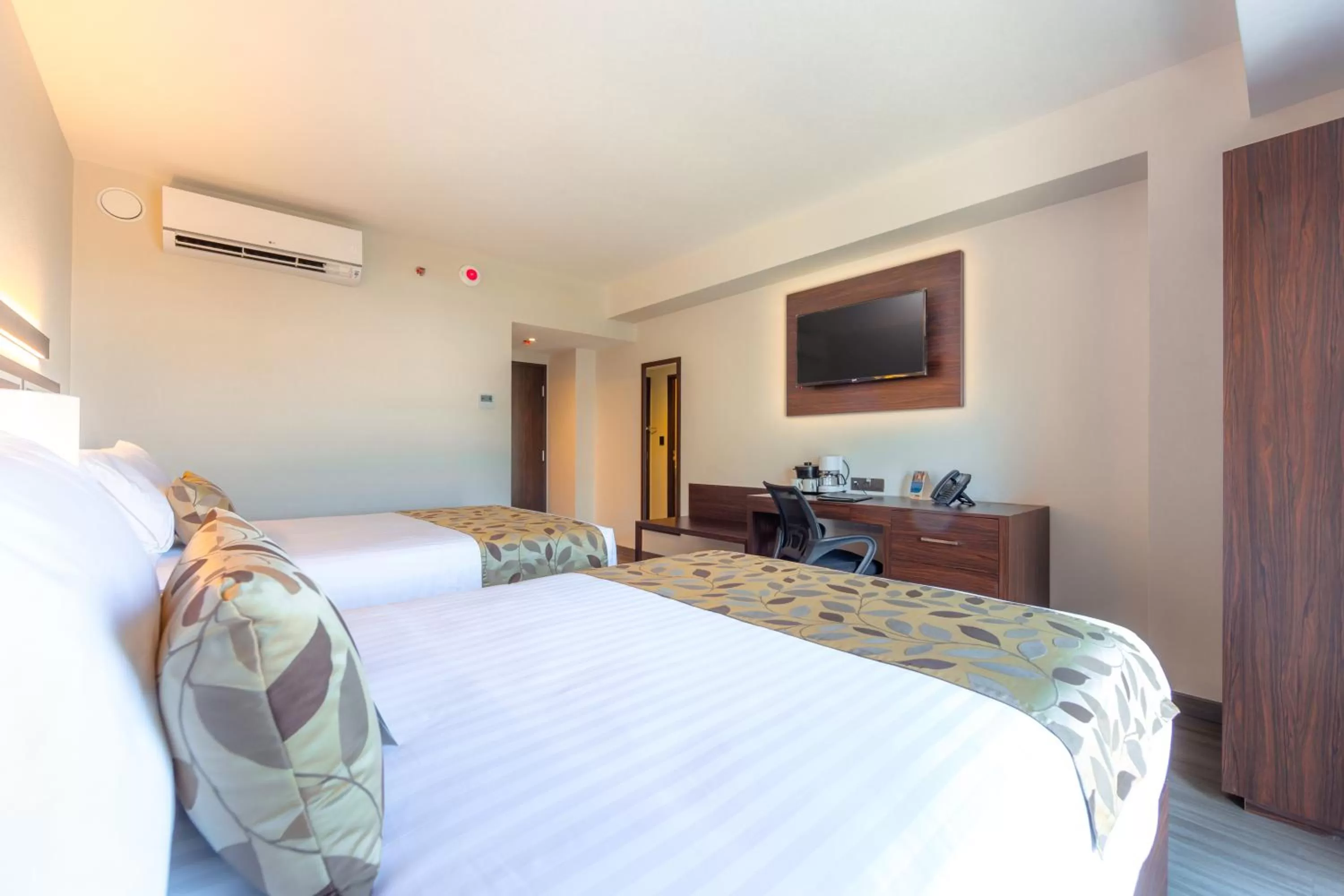 Bed in Sleep Inn Guadalajara Galerias