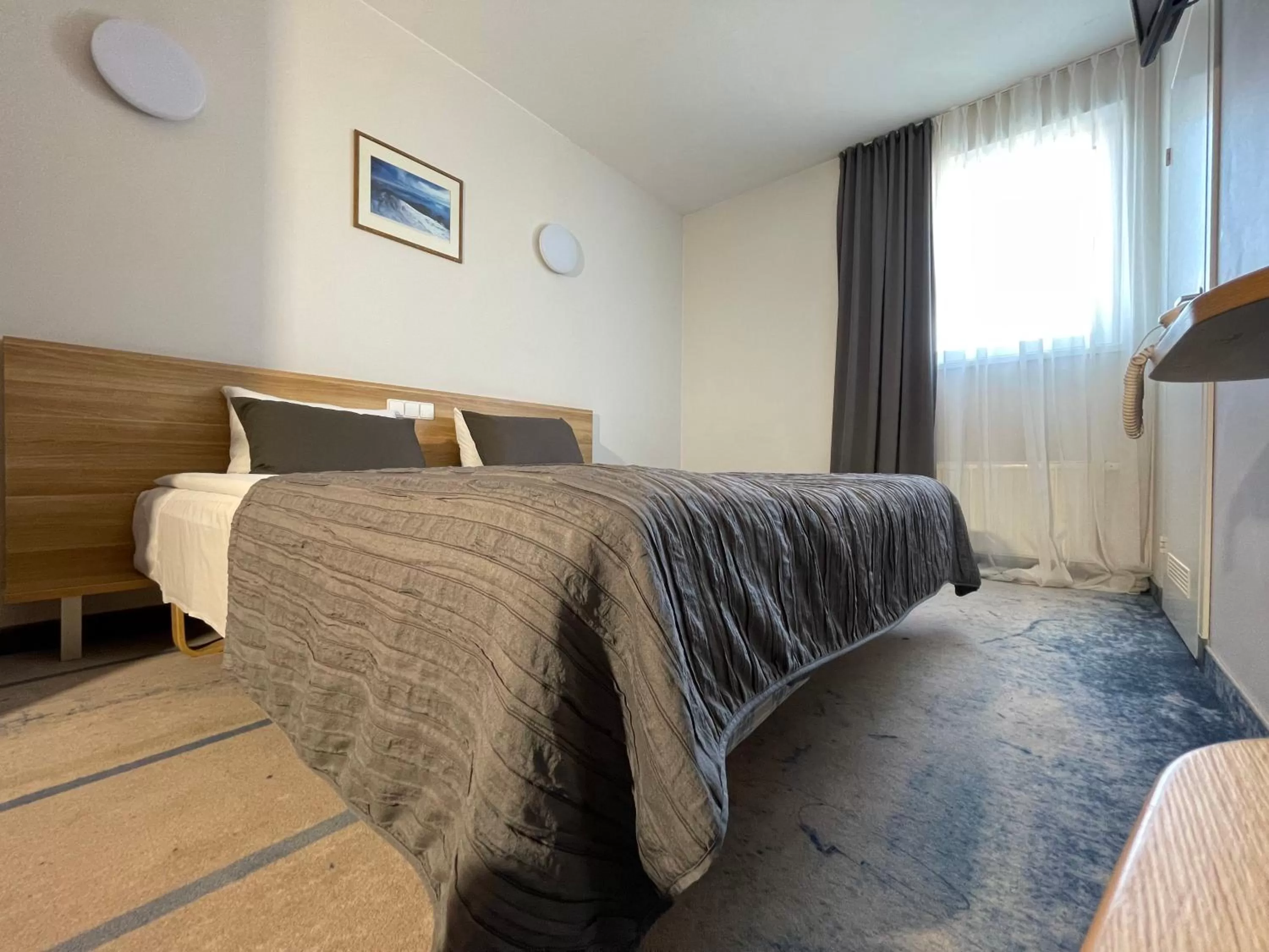 Bed in Green Vilnius Hotel