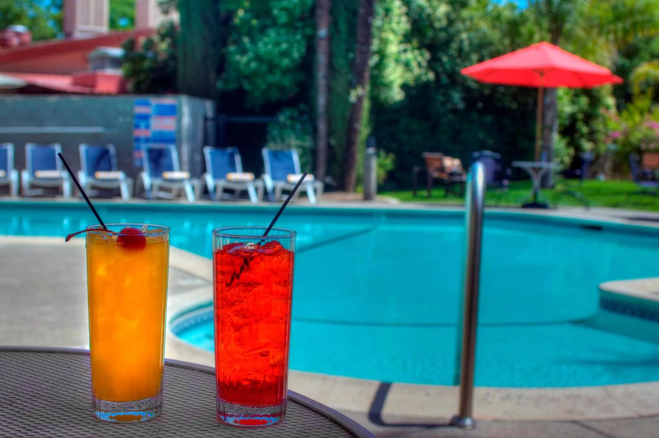 Swimming pool in University Park Inn & Suites, an Ascend Collection Hotel