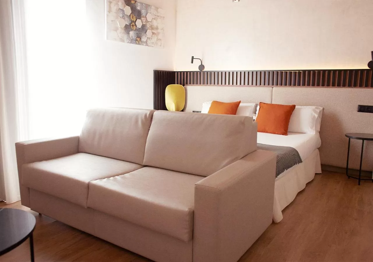 Photo of the whole room in ISA Sevilla Suites