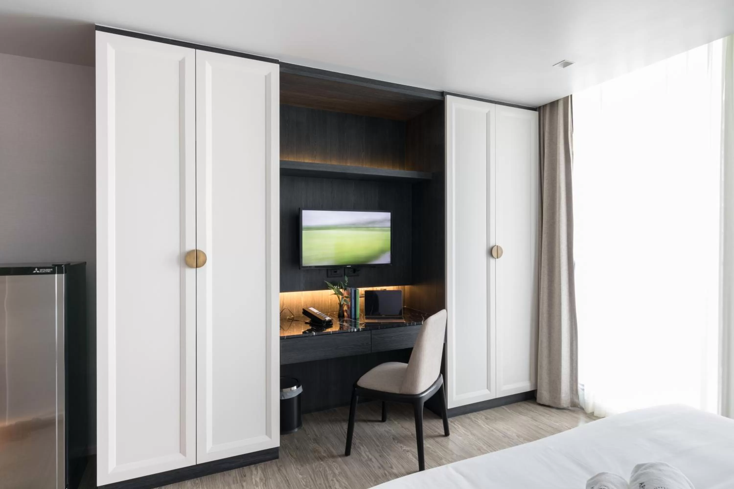 Communal lounge/ TV room, Bed in Apartelle Jatujak Hotel