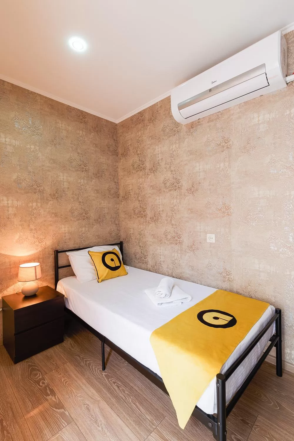 Bed in Aura Plaza Hotel