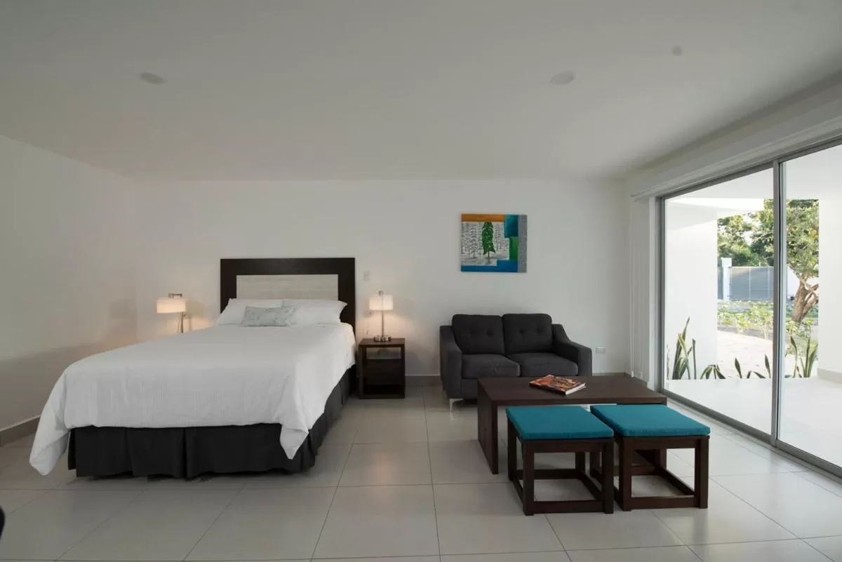 Living room, Bed in Hotel Nicte