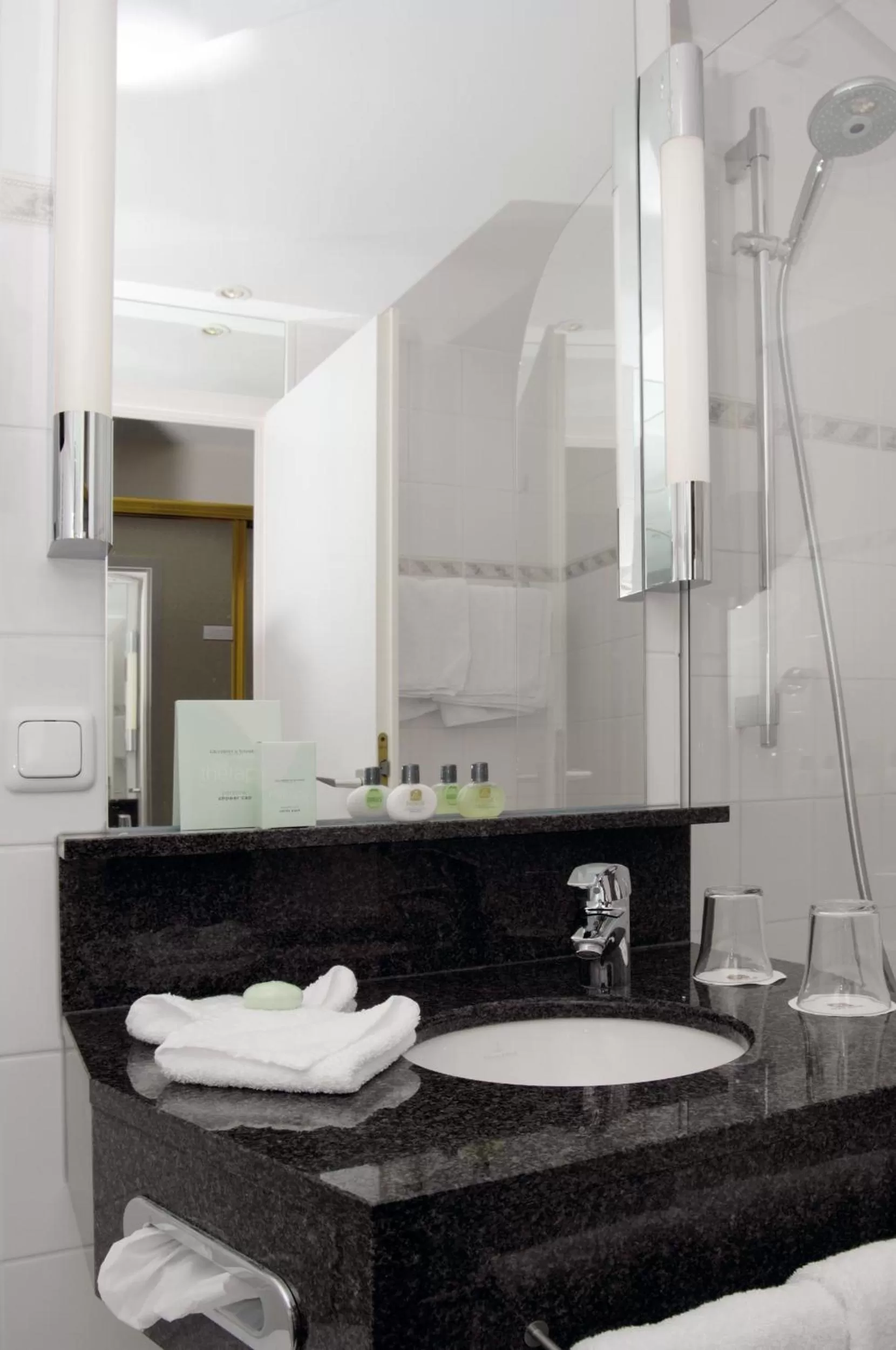 Bathroom in ambassador hotel & spa