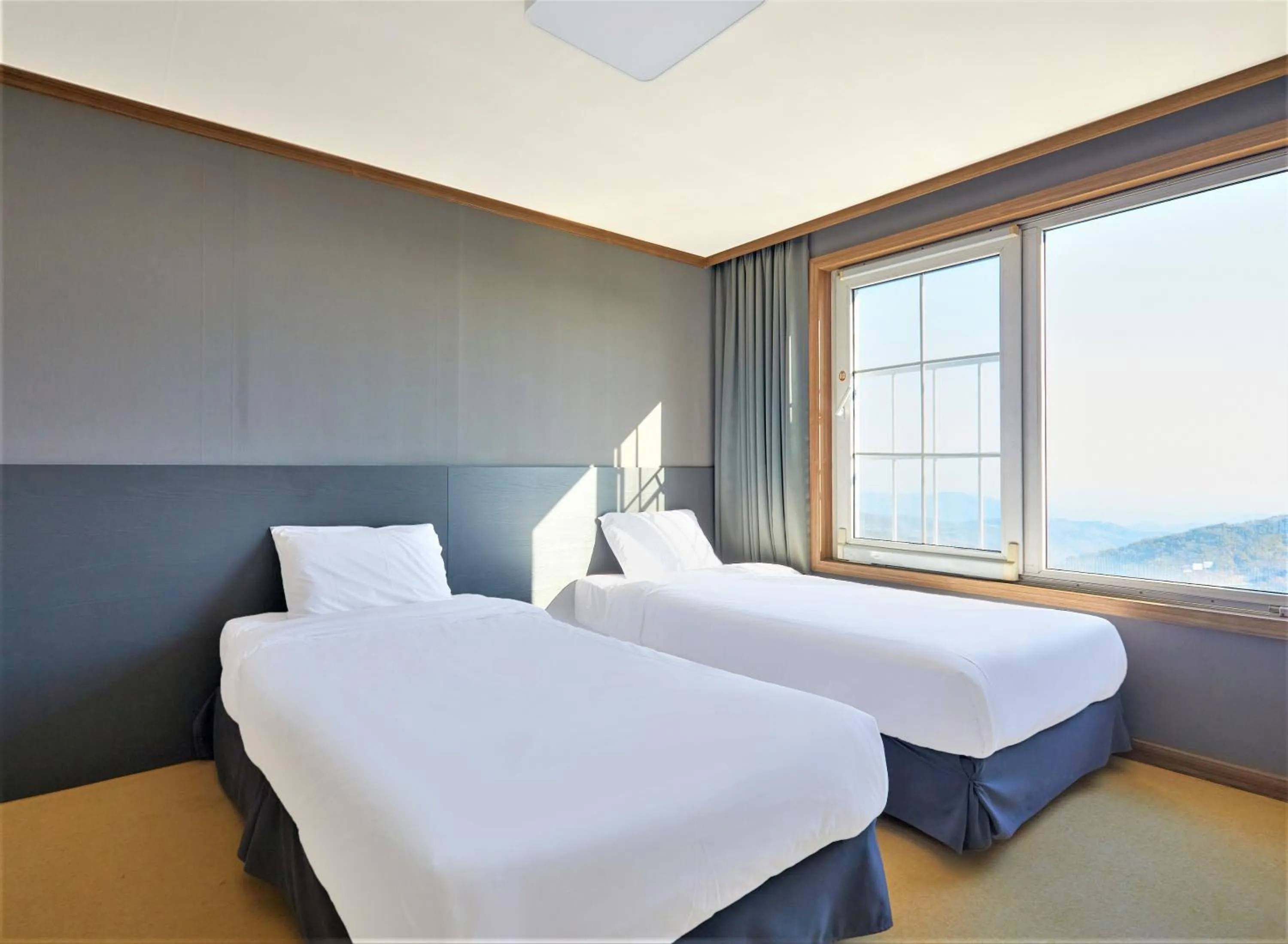 Bed in Gyeongju Mauna Ocean Resort
